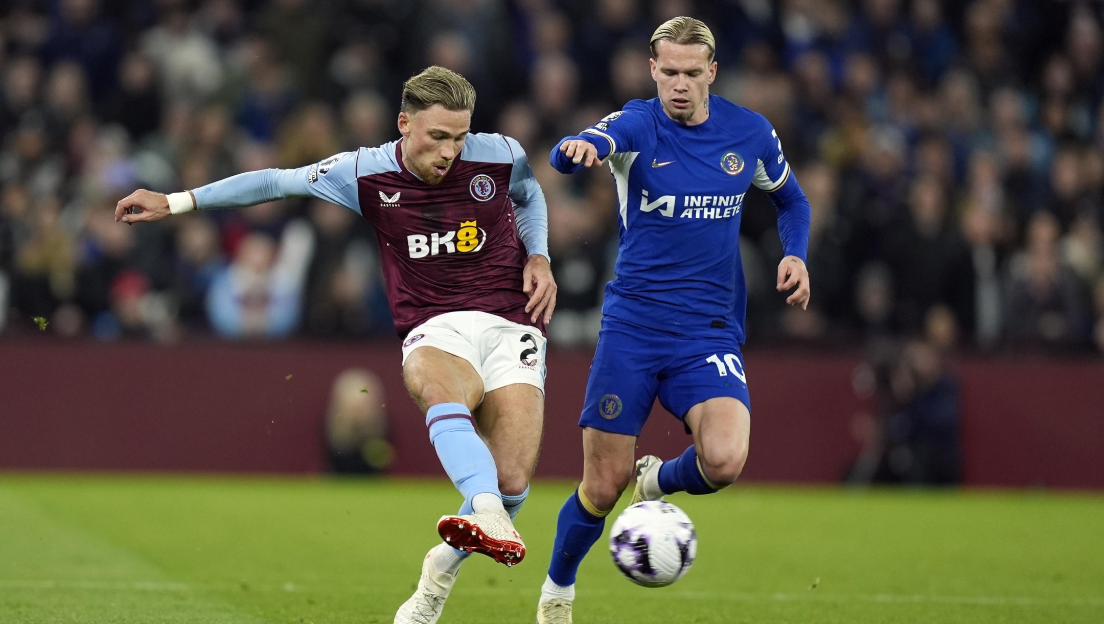 epa11305738 Matty Cash of Aston Villa (L) and Chelsea's Mykhaylo Mudryk (R) in action during the English Premier League soccer match between Aston Villa FC and Chelsea FC, in Birmingham, Britain, 27 April 2024.  EPA/TIM KEETON EDITORIAL USE ONLY. No use with unauthorized audio, video, data, fixture lists, club/league logos, 'live' services or NFTs. Online in-match use limited to 120 images, no video emulation. No use in betting, games or single club/league/player publications.