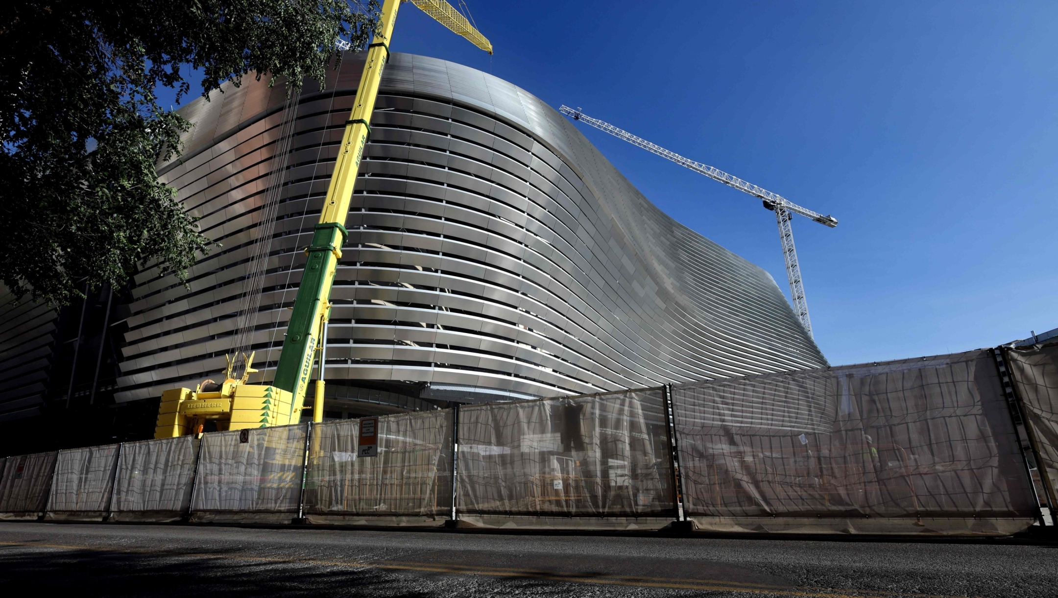 This photograph taken on June 30, 2023 shows a general view of the new style of the facade of the under construction Bernabeu stadium in Madrid. (Photo by Thomas COEX / AFP)