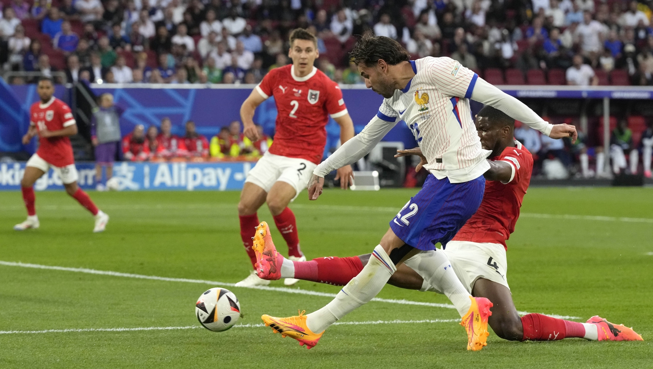 Theo Hernandez of France makes an attempt to score during a Group D match between Austria and France at the Euro 2024 soccer tournament in Duesseldorf, Germany, Monday, June 17, 2024. (AP Photo/Frank Augstein)