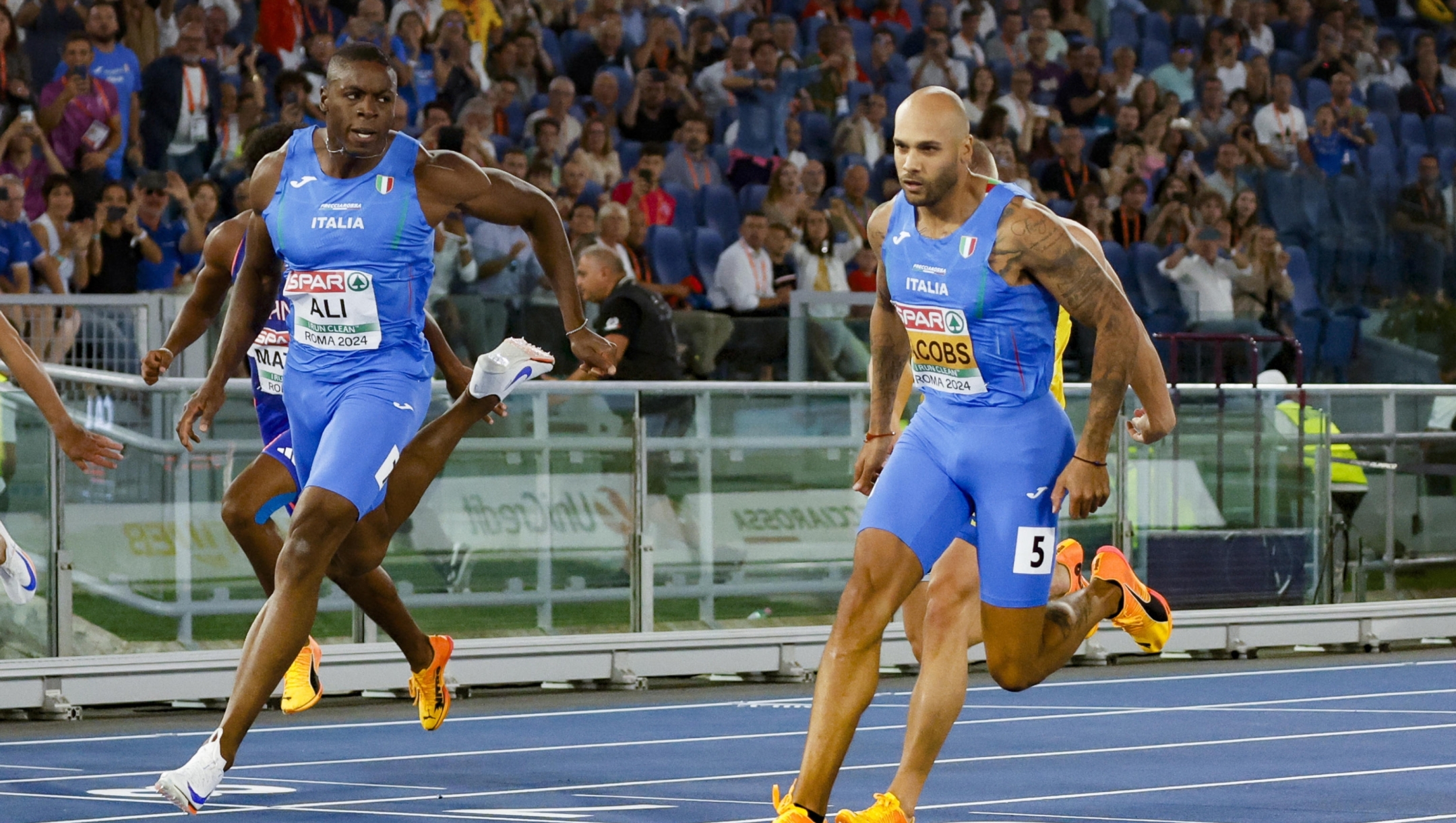 Chituru Ali (L) of Italy and Marcell Jacobs of Italy compete at the 100m Men Final during the European Athletics Championship at Olimpico Stadium in Rome, Italy, 08 June 2024. ANSA/FABIO FRUSTACI