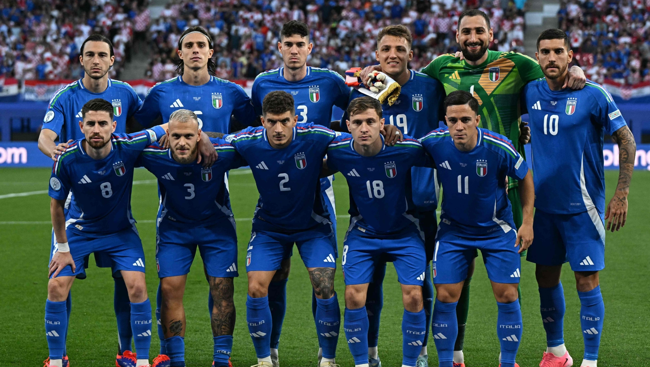 (From L) Italy's defender #13 Matteo Darmian, Italy's midfielder #08 Jorginho, Italy's defender #03 Federico Dimarco, Italy's defender #05 Riccardo Calafiori, Italy's defender #02 Giovanni Di Lorenzo, Italy's defender #23 Alessandro Bastoni, Italy's midfielder #18 Nicolo Barella, Italy's forward #19 Mateo Retegui, Italy's forward #11 Giacomo Raspadori, Italy's goalkeeper #01 Gianluigi Donnarumma and Italy's midfielder #10 Lorenzo Pellegrini pose for a team photo ahead of kick-off in the UEFA Euro 2024 Group B football match between the Croatia and Italy at the Leipzig Stadium in Leipzig on June 24, 2024. (Photo by GABRIEL BOUYS / AFP)