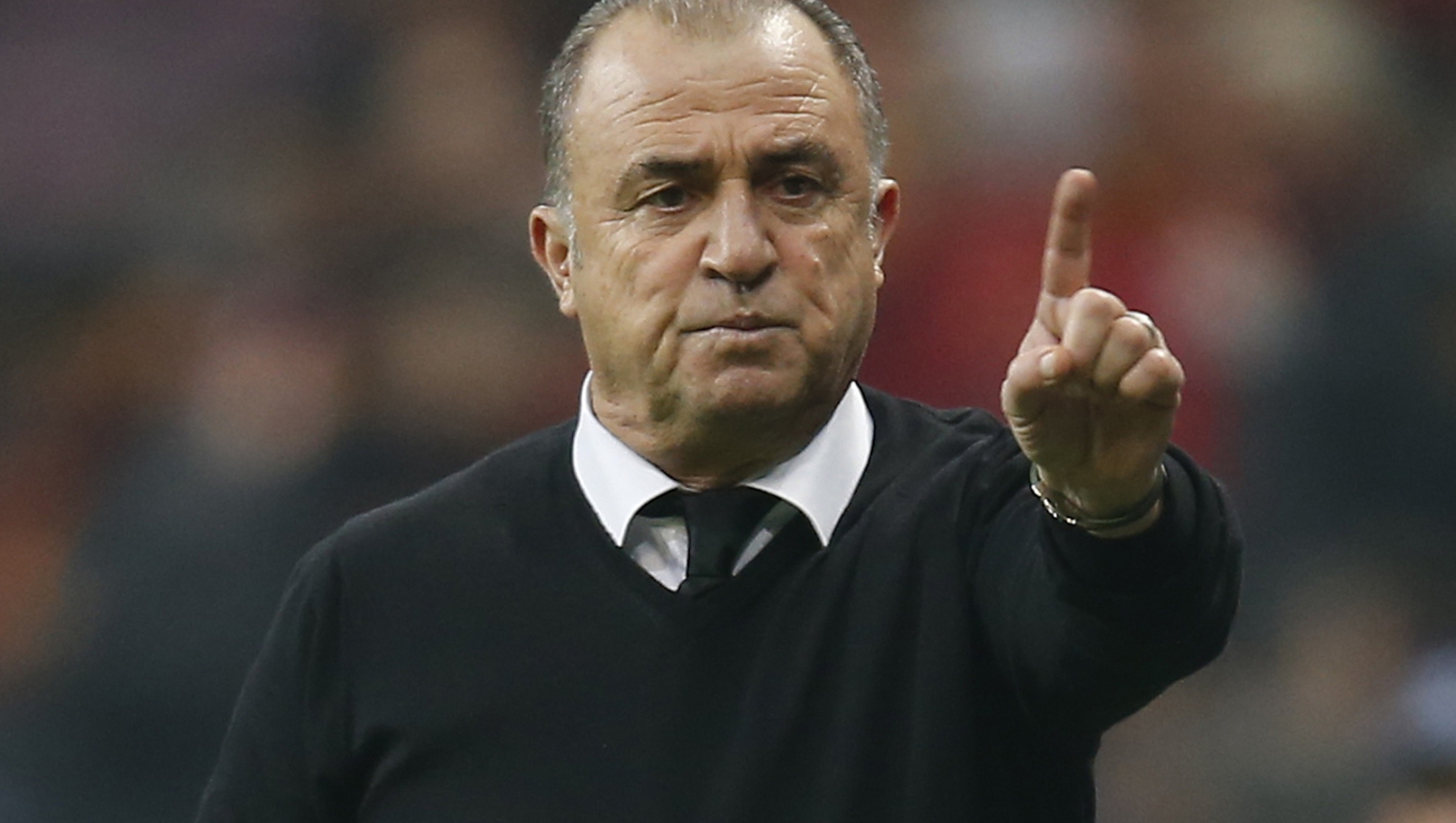FILE-In this Tuesday, Dec. 11, 2018 file photo, Galatasaray's manager Fatih Terim,  gives instructions to his players during the Champions League Group D soccer match between Galatasaray and Porto in Istanbul. Terim, 66, announced on Twitter on Monday, March 23, 2020 that he has tested positive for the new coronavirus. Earlier, Galatasaray's deputy president Abdurrahman Albayrak also tested positive for the virus. (AP Photo/Lefteris Pitarakis,File)