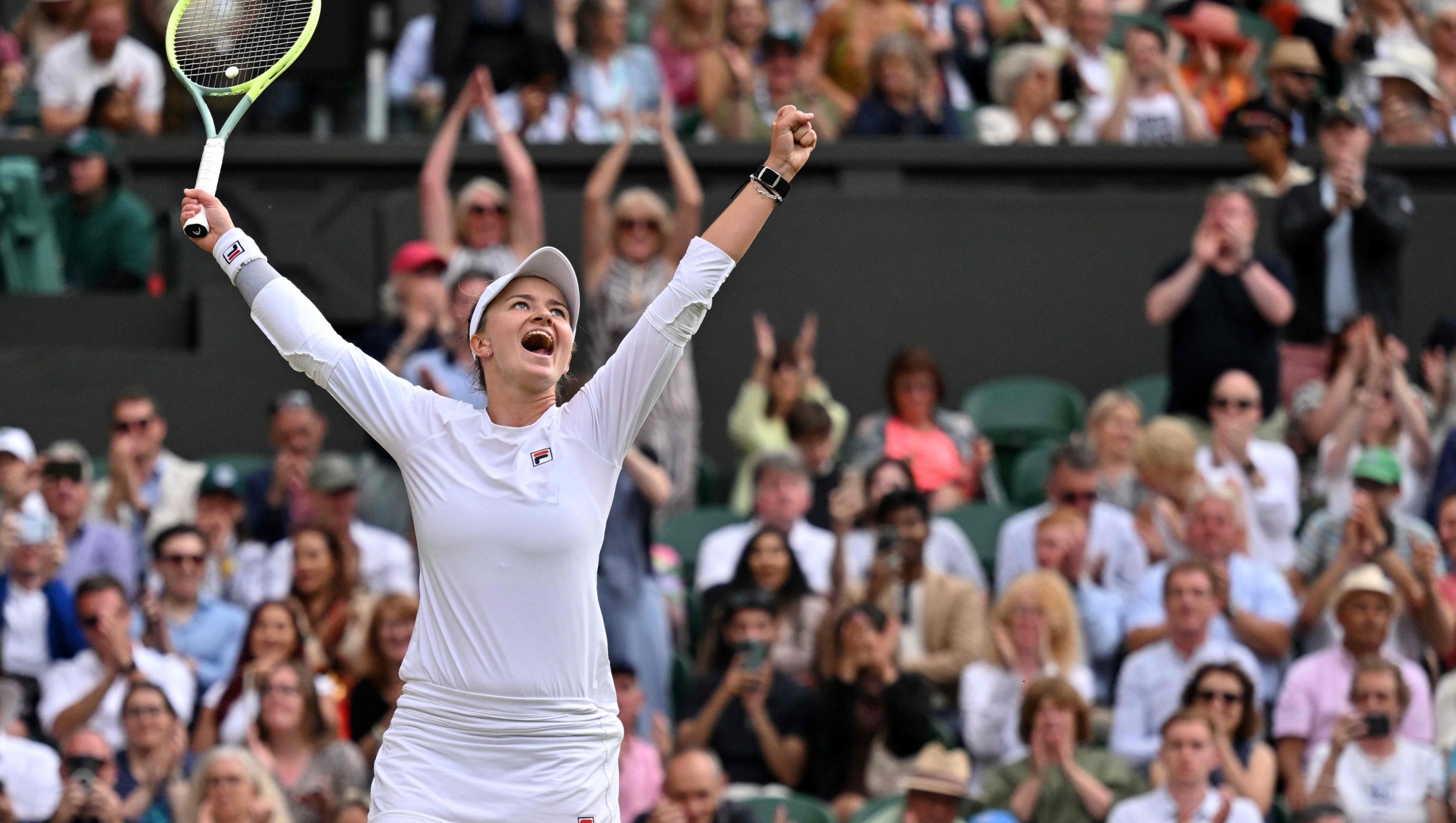 Czech Republic's Barbora Krejcikova celebrates winning against Kazakhstan's Elena Rybakina during their women's singles semi-final tennis match on the eleventh day of the 2024 Wimbledon Championships at The All England Lawn Tennis and Croquet Club in Wimbledon, southwest London, on July 11, 2024. Barbora Krejcikova won 3-6, 6-3, 6-4. (Photo by ANDREJ ISAKOVIC / AFP) / RESTRICTED TO EDITORIAL USE