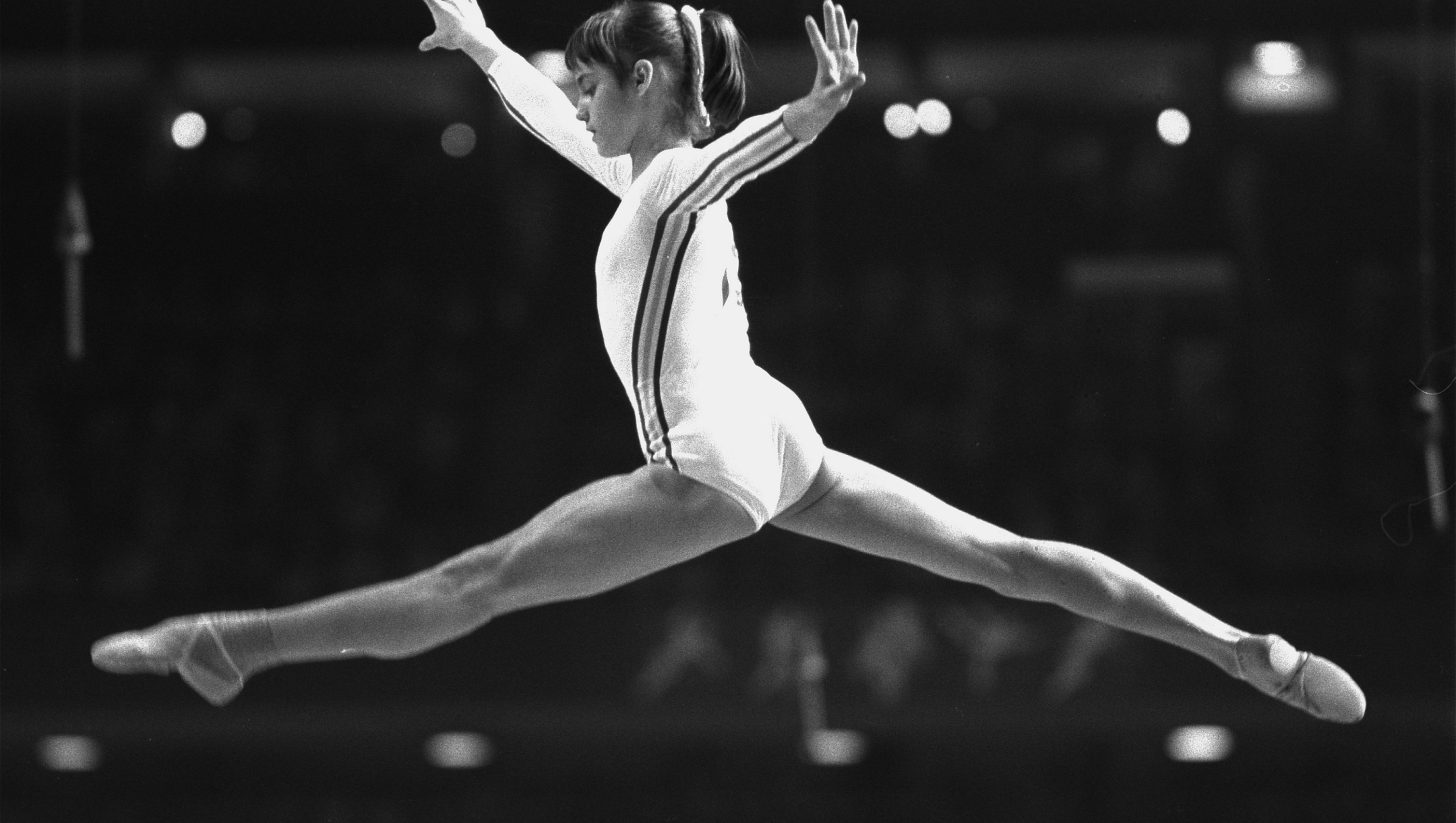 ** FILE ** Nadia Comaneci performs on the horse vault at the Summer Olympics in Montreal, in this July 18, 1976 photo. Comaneci defended her perfect 10s in gymnastics at the Montreal Games, last week at the gymnastics European Chmapionships in Amsterdam, Netherlands,  after a top Olympic official said the scores were inflated. (AP Photo)