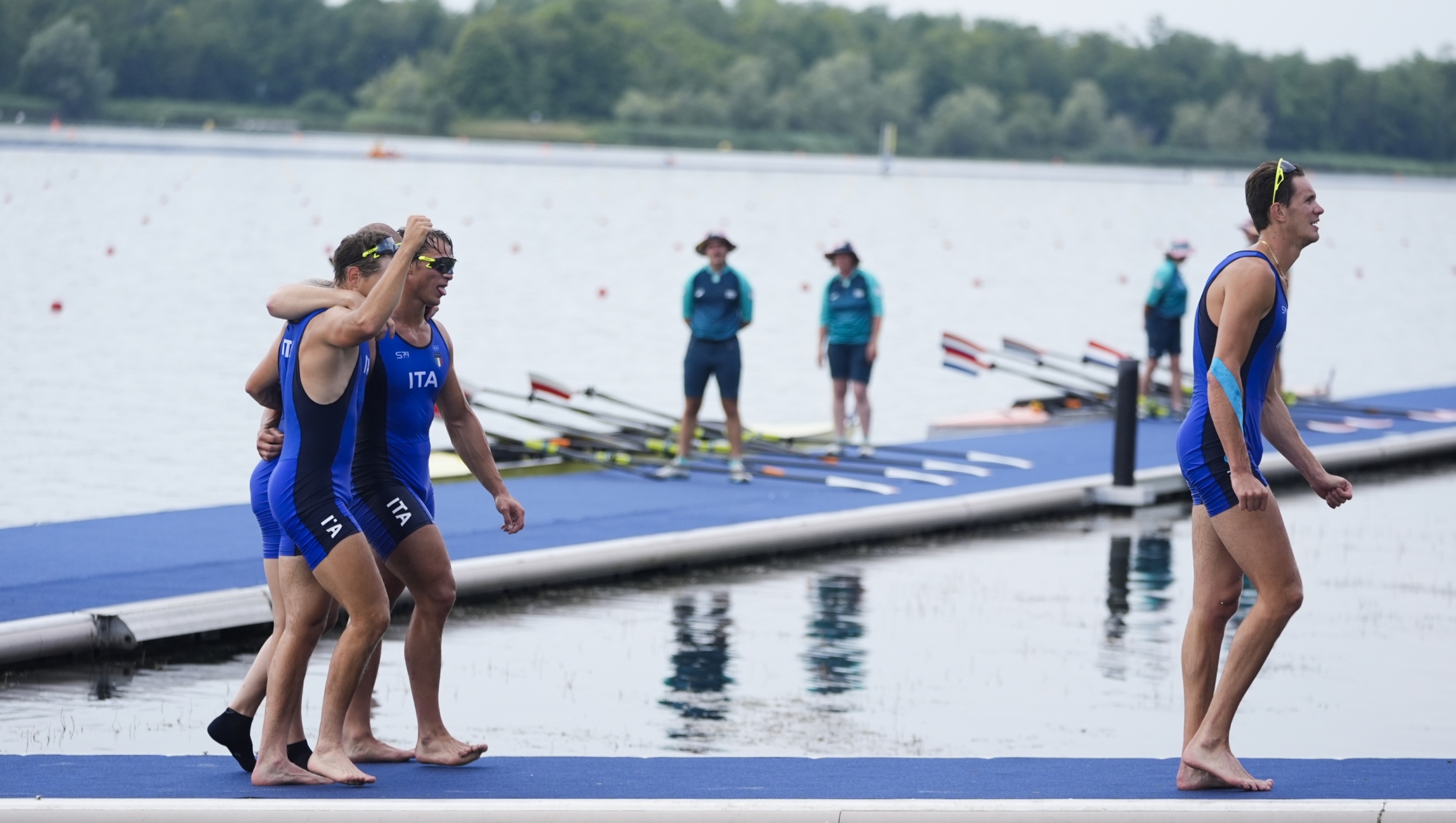 Italy's Giacomo Gentili, Andrea Panizza, Luca Rambaldi, and Luca Chiumento celebrate a silver medal in the men's quadruple sculls rowing final at the 2024 Summer Olympics, Wednesday, July 31, 2024, in Vaires-sur-Marne, France. (AP Photo/Lindsey Wasson)