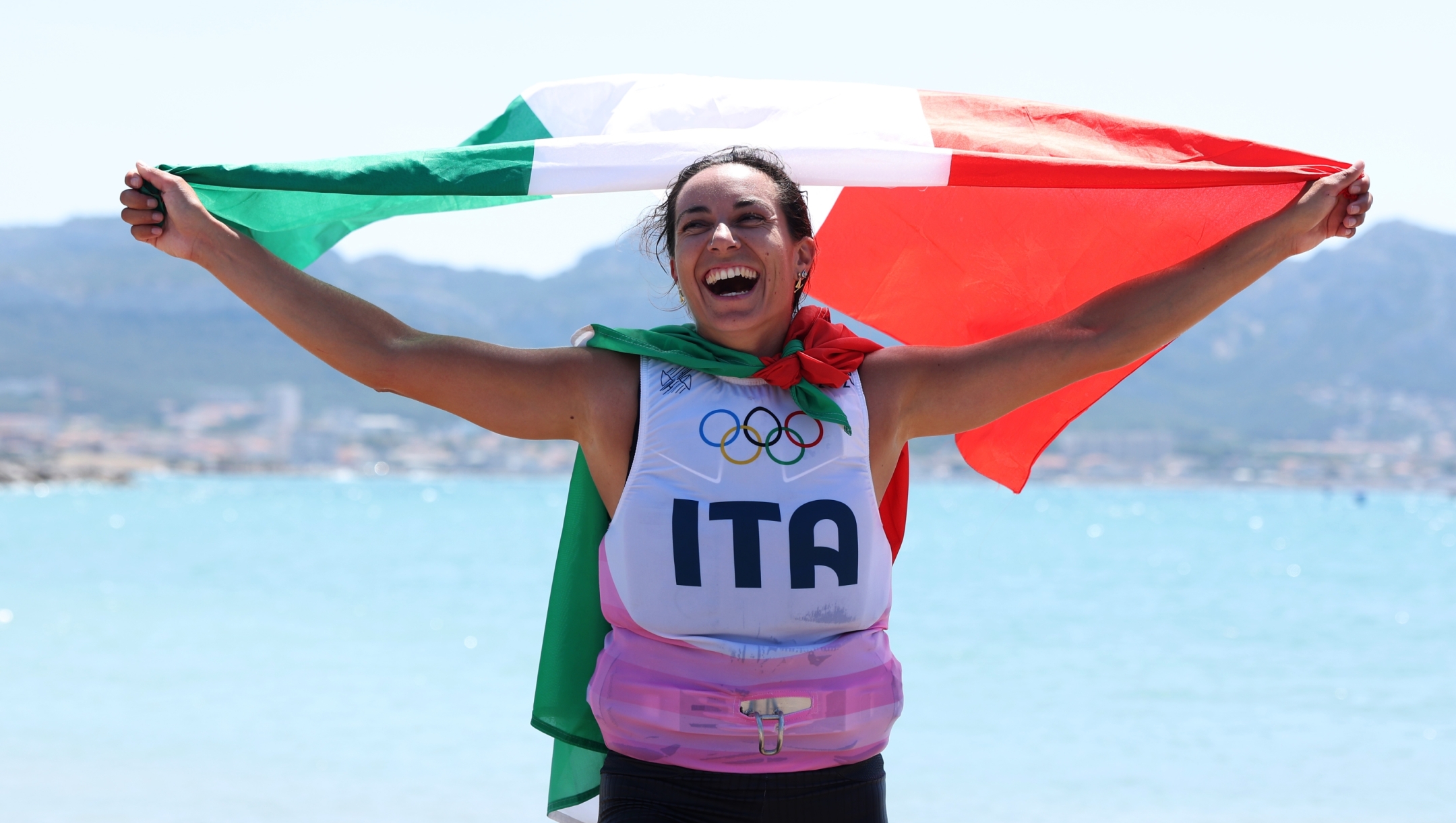 MARSEILLE, FRANCE - AUGUST 03: Marta Maggetti of Team Italy celebrates winning the Gold medal in the Women's Windsurf iQFoil class final on day eight of the Olympic Games Paris 2024 at Marseille Marina on August 03, 2024 in Marseille, France. (Photo by Alex Livesey/Getty Images)