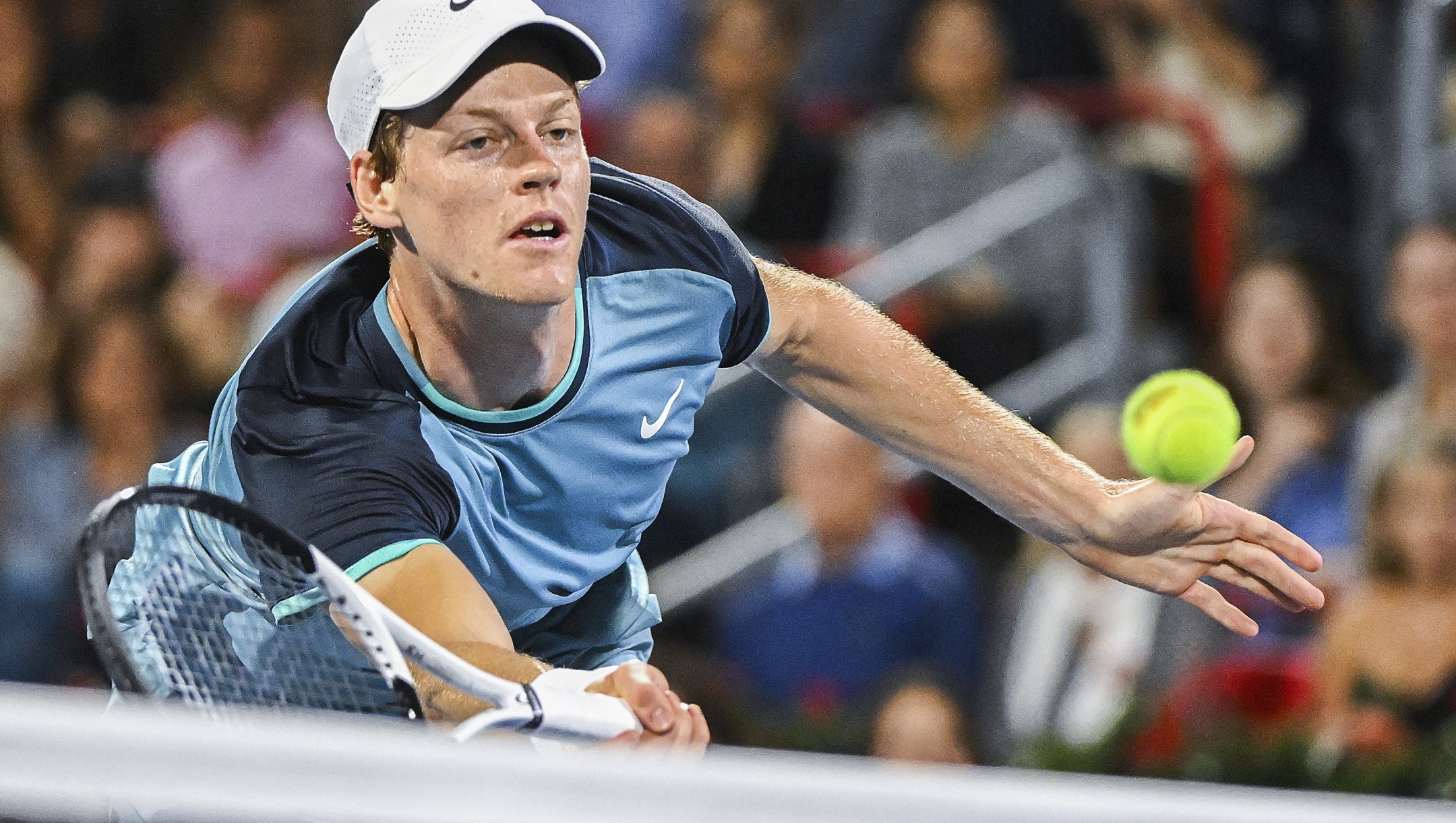 Jannik Sinner, of Italy, plays a shot to Andrey Rublev, of Russia, during their quarterfinal match at the National Bank Open tennis tournament in Montreal, Saturday, Aug. 10, 2024. (Graham Hughes/The Canadian Press via AP)