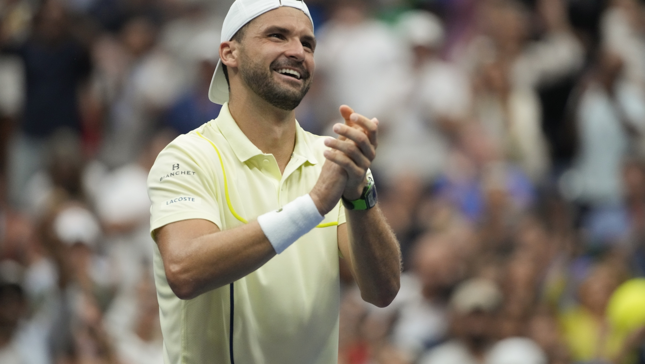 Grigor Dimitrov, of Bulgaria, reacts after defeating Andrey Rublev, of Russia, during the fourth round of the U.S. Open tennis championships, Sunday, Sept. 1, in New York. 2024. (AP Photo/Pamela Smith)