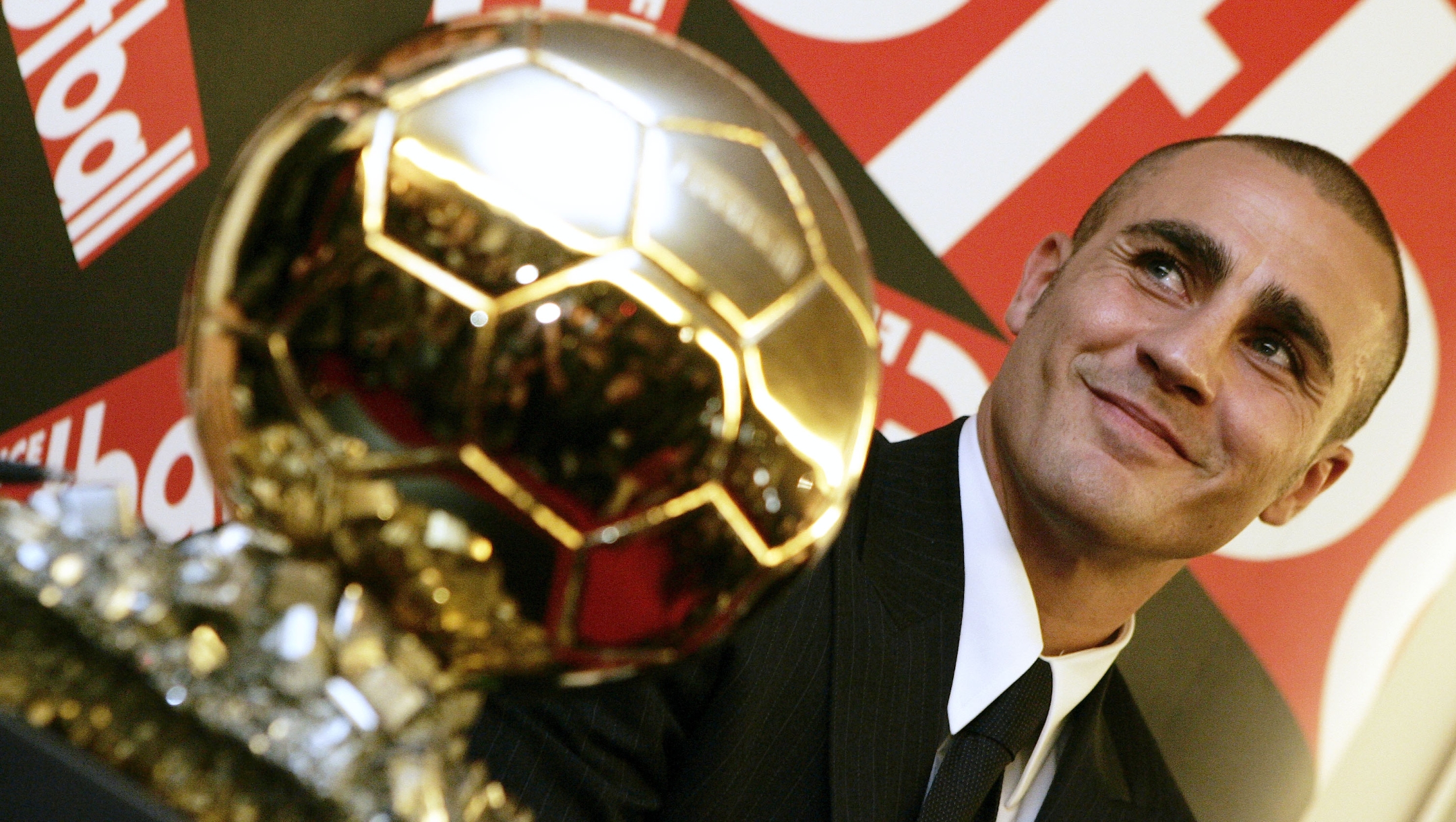 Real Madrid's Fabio Cannavaro, the captain of Italy's soccer World Cup champion team, poses with his Golden Ball award during a press conference at the headquarters of French sports daily "L'Equipe", Monday, Nov. 27, 2006 in Issy-les-Moulineaux, outside Paris. Cannavaro won the 2006 Golden Ball trophy, the French football magazine's prestigious award as Europe's top player. (AP Photo/Francois Mori)