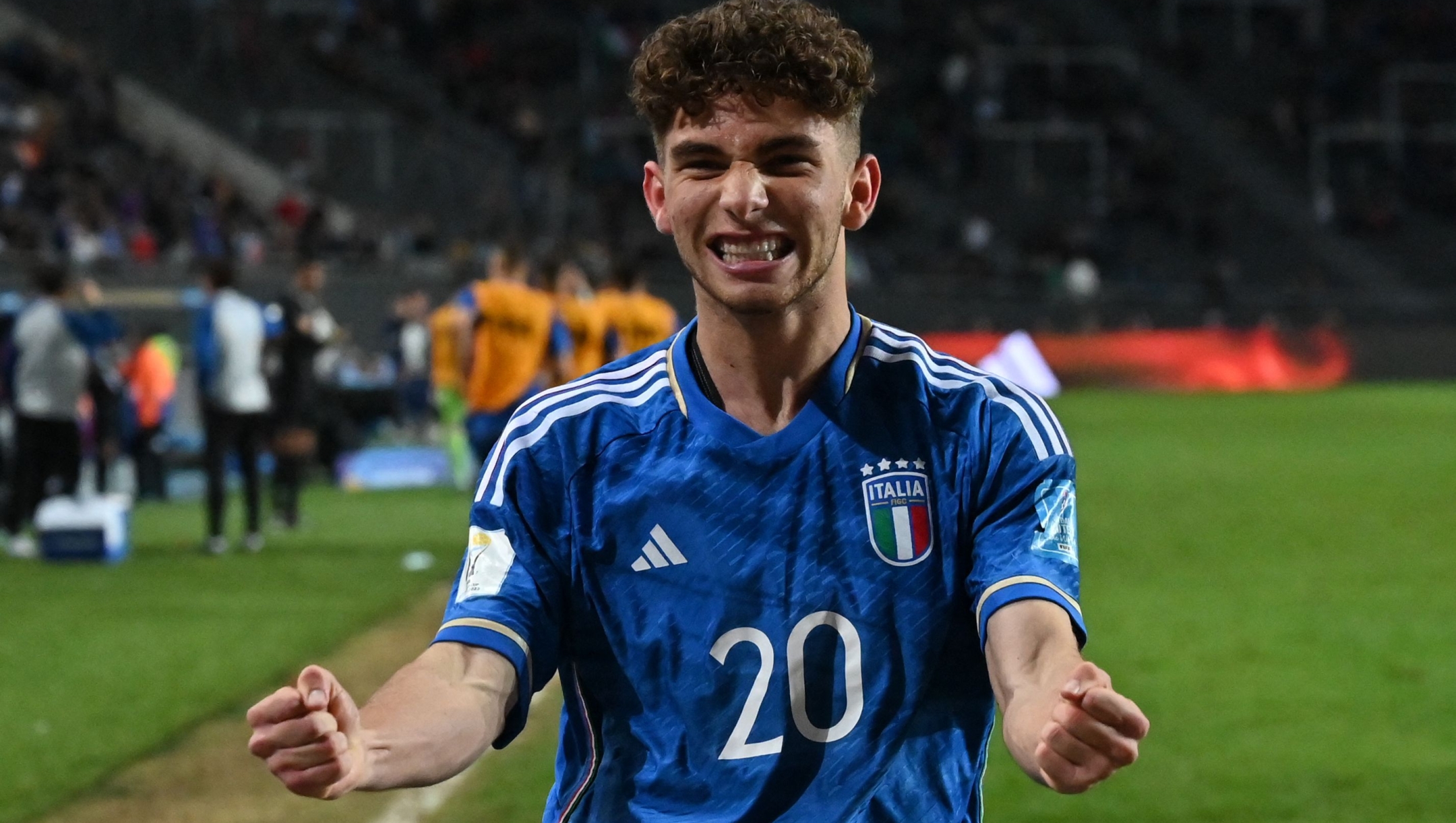 Italy's midfielder Simone Pafundi celebrates after scoring a goal from a free-kick during the Argentina 2023 U-20 World Cup semi-final match between Italy and South Korea at the Estadio Unico Diego Armando Maradona stadium in La Plata, Argentina, on June 8, 2023. (Photo by Luis ROBAYO / AFP)