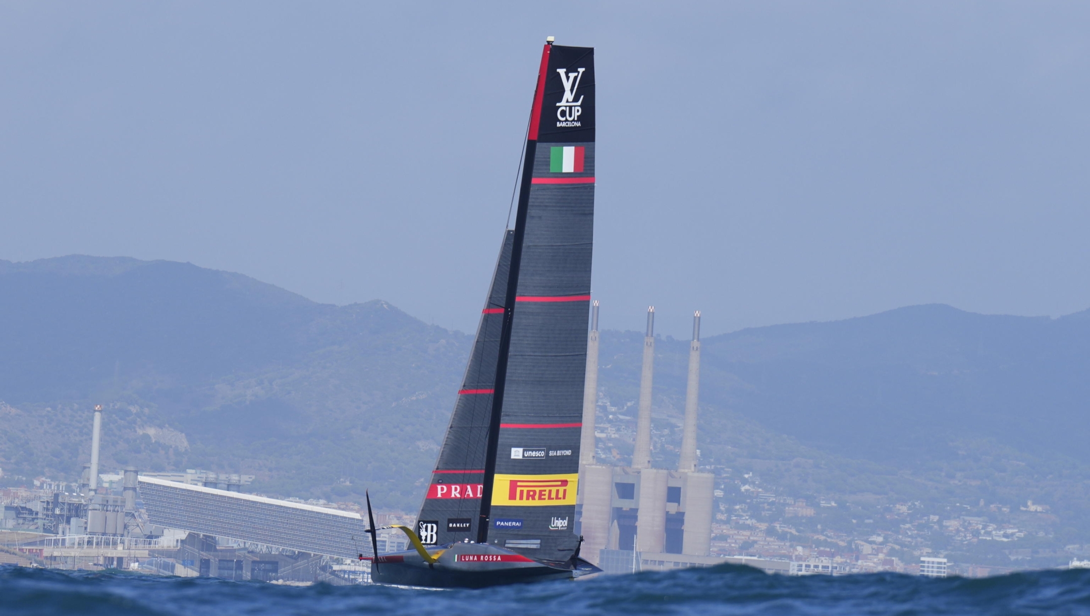 epa11591182 Luna Rossa Prada Pirelli of Italy in action during day eight of the 2024 Louis Vuitton Cup sailing competition in Barcelona, Spain, 07 September 2024.  EPA/Siu Wu