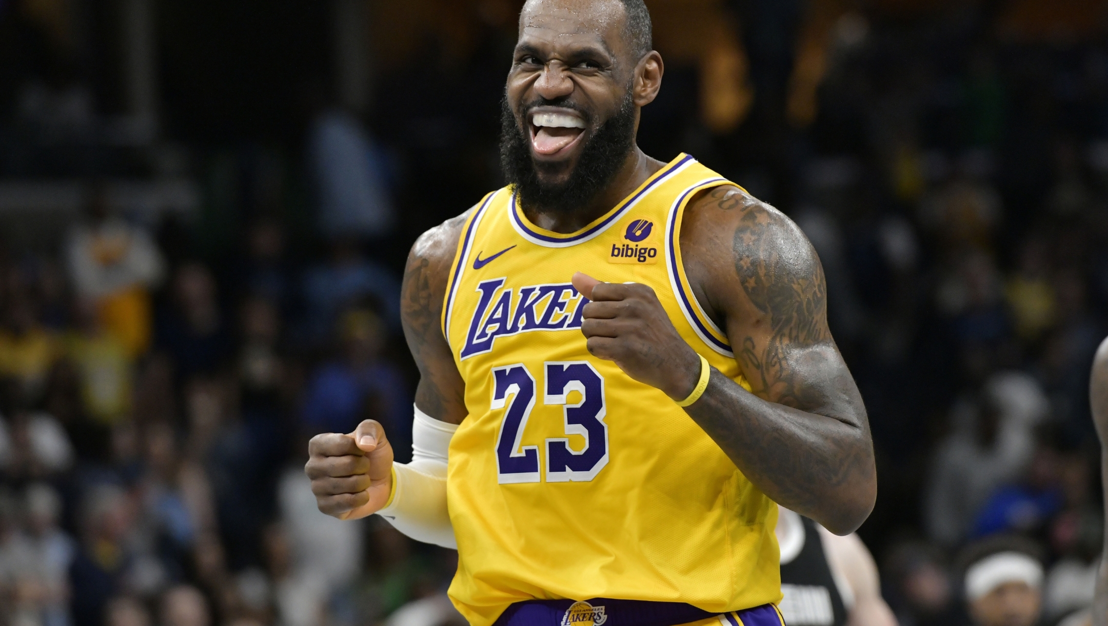 Los Angeles Lakers forward LeBron James (23) looks toward the Memphis Grizzlies' bench during the second half of an NBA basketball game Friday, April 12, 2024, in Memphis, Tenn. (AP Photo/Brandon Dill)