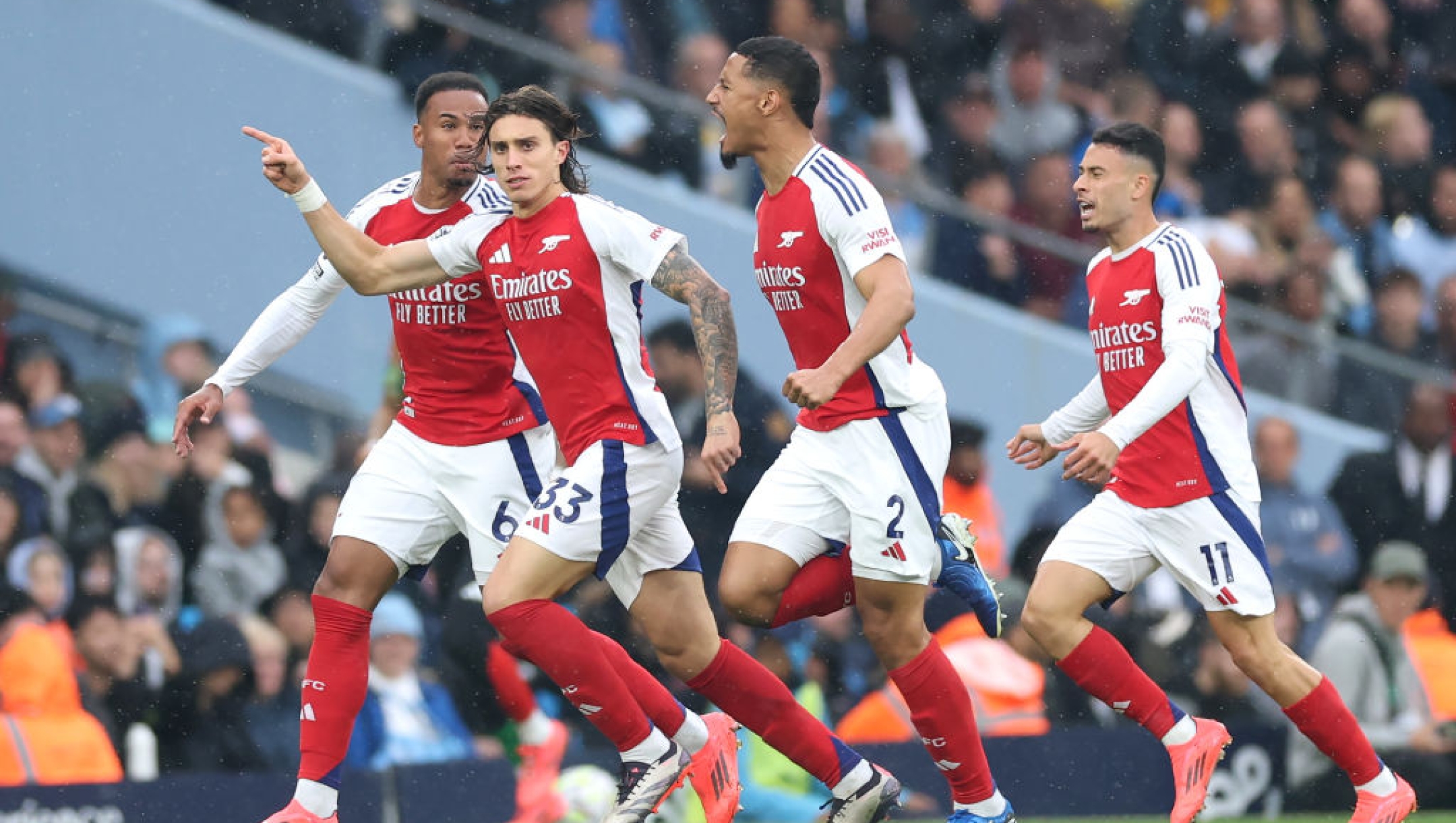 MANCHESTER, ENGLAND - SEPTEMBER 22: Riccardo Calafiori of Arsenal celebrates scoring his team's first goal during the Premier League match between Manchester City FC and Arsenal FC at Etihad Stadium on September 22, 2024 in Manchester, England. (Photo by Carl Recine/Getty Images)