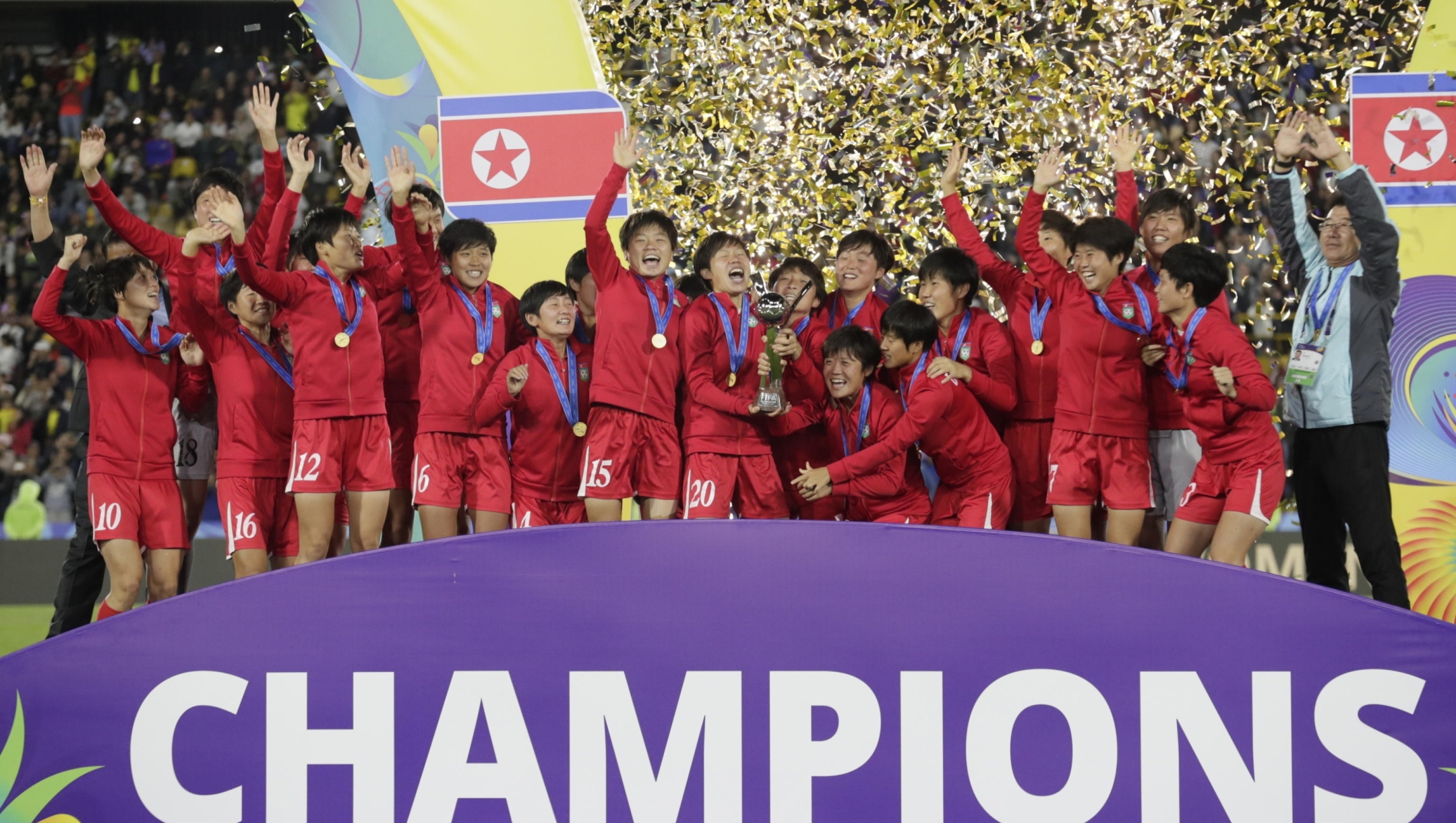 epa11620037 North Korean players celebrate after winning the FIFA Under-20 Women's World Cup Final against Japan at the El Campin stadium in Bogota, Colombia, 22 September 2024.  EPA/Carlos Ortega