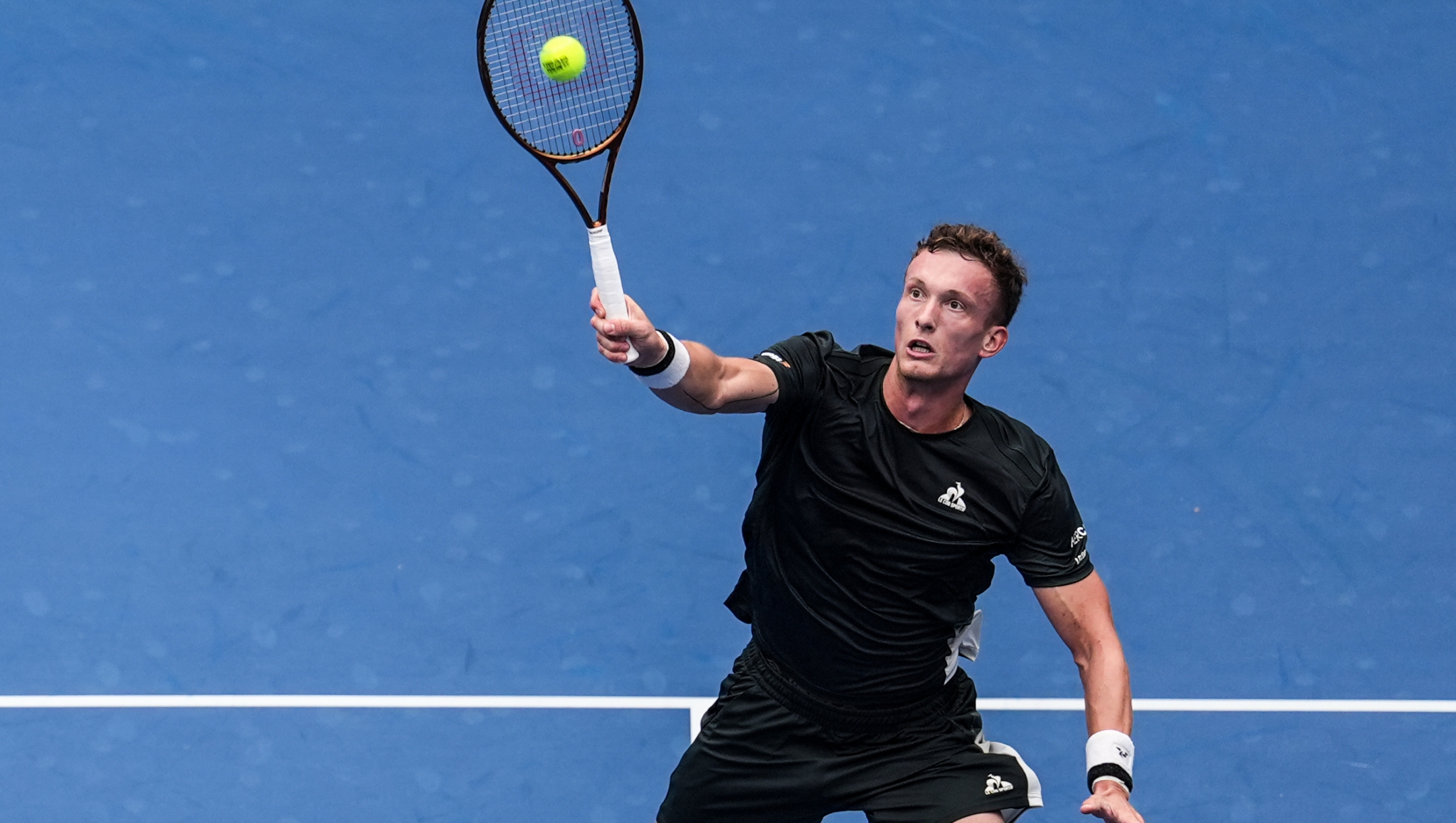 BEIJING, CHINA - SEPTEMBER 28: Jiri Lehecka of Czech Republic plays a forehand smash in the Men's Singles Second Round against Roberto Bautista Agut of Spain during day six of the 2024 China Open at National Tennis Center on September 28, 2024 in Beijing, China. (Photo by Shi Tang/Getty Images)