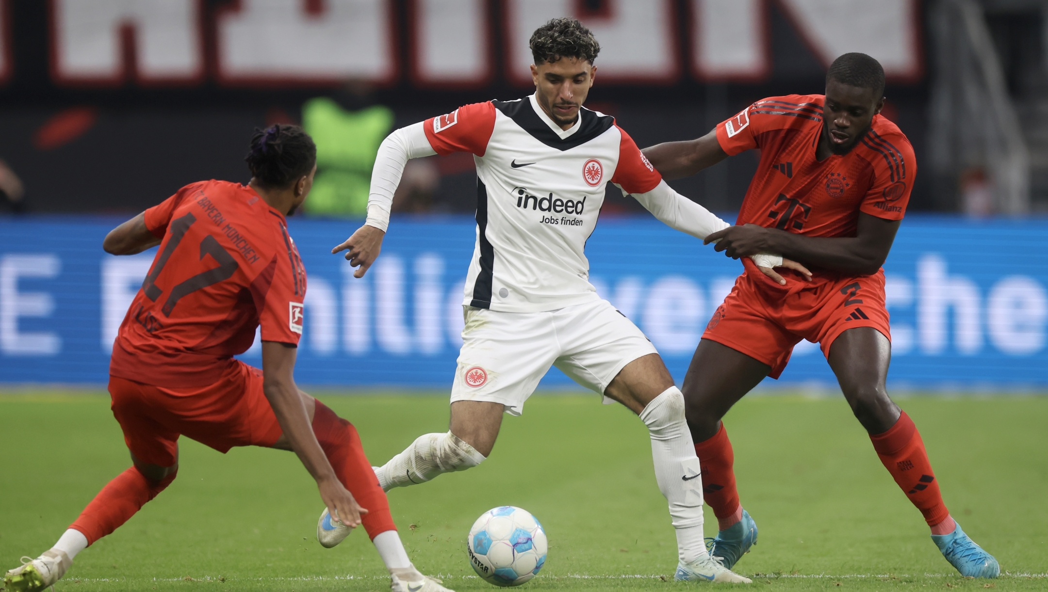 FRANKFURT AM MAIN, GERMANY - OCTOBER 06: Omar Marmoush of Eintracht Frankfurt is challenged by Dayot Upamecano of Bayern Munich during the Bundesliga match between Eintracht Frankfurt and FC Bayern München at Deutsche Bank Park on October 06, 2024 in Frankfurt am Main, Germany. (Photo by Alex Grimm/Getty Images)