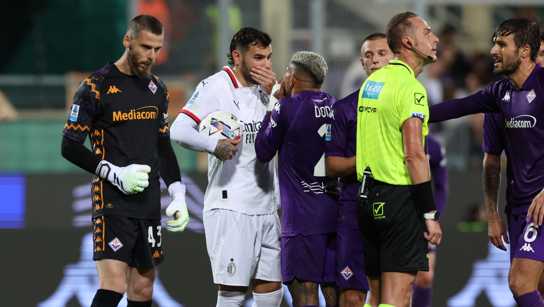 FLORENCE, ITALY - OCTOBER 06: Theo Hernandez of AC Milan in reacts with Dodo of Fiorentina during the Serie A match between Fiorentina and Milan at Stadio Artemio Franchi on October 06, 2024 in Florence, Italy. (Photo by Claudio Villa/AC Milan via Getty Images)