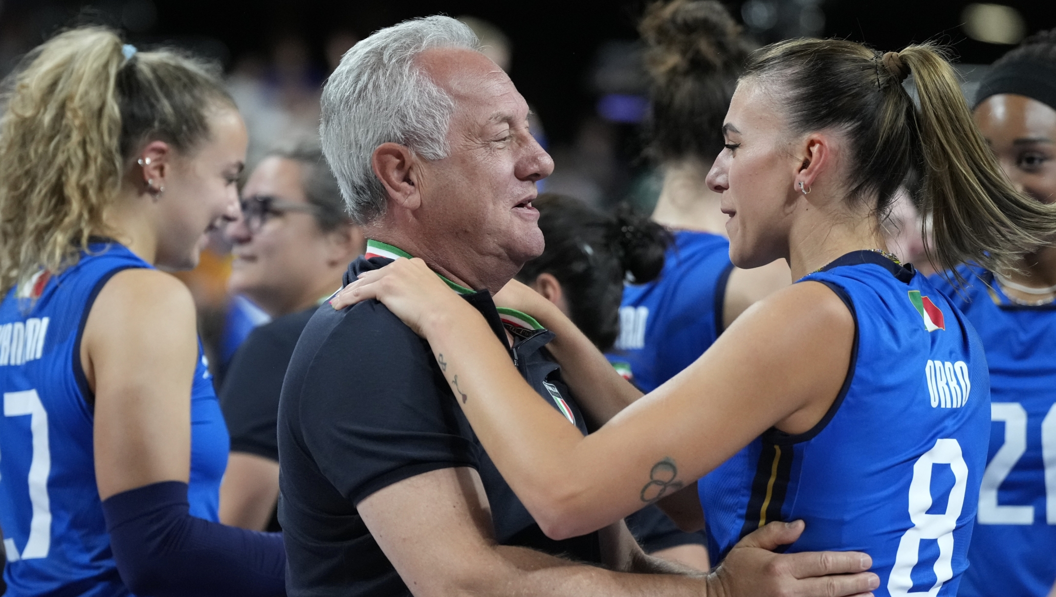 Italy's coach Julio Velasco celebrates with Alessia Orro of Italy after winning the gold medal women's volleyball match between the United States of America and Italy at the 2024 Summer Olympics, Sunday, Aug. 11, 2024, in Paris, France. (AP Photo/Alessandra Tarantino)    Associated Press / LaPresse Only italy and Spain