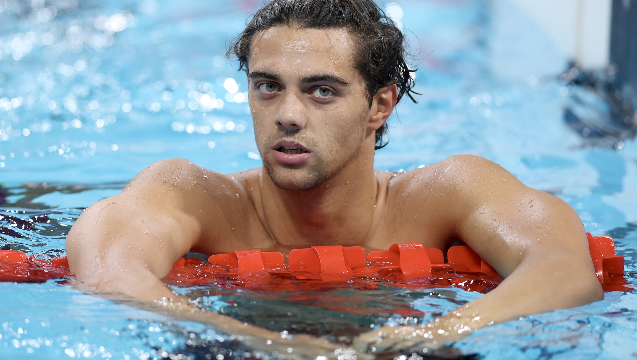 NANTERRE, FRANCE - JULY 31: Thomas Ceccon of Team Italy reacts after competing in the Men's 200m Backstroke Semifinals on day five of the Olympic Games Paris 2024 at Paris La Defense Arena on July 31, 2024 in Nanterre, France. (Photo by Maddie Meyer/Getty Images)