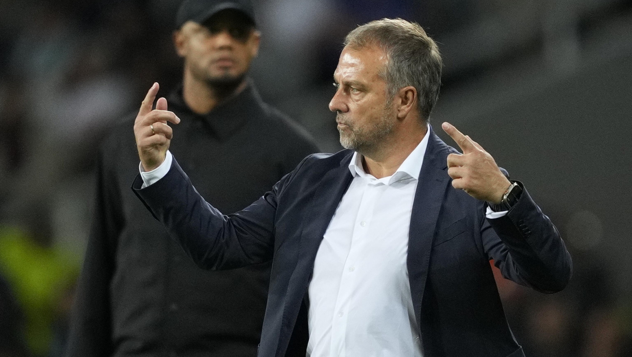 epa11678527 Barcelona's head coach Hansi Flick gestures during the UEFA Champions League soccer match between FC Barcelona and Bayern Munich, in Barcelona, Spain, 23 August 2024.  EPA/Alejandro Garcia