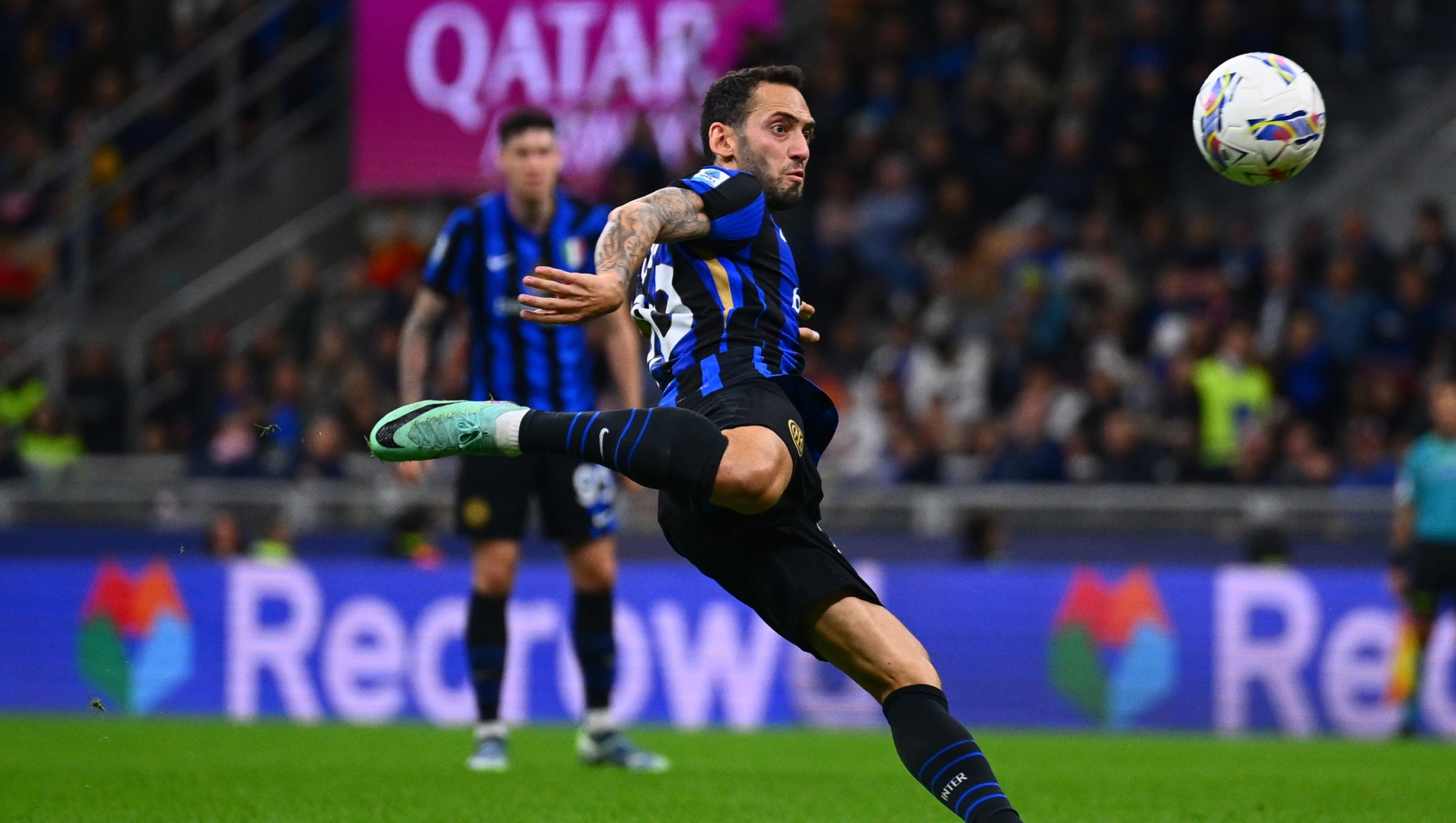 MILAN, ITALY - OCTOBER 05:  Hakan Calhanoglu of FC Internazionale in action during the Serie A match between FC Internazionale and Torino at Stadio Giuseppe Meazza on October 05, 2024 in Milan, Italy. (Photo by Mattia Pistoia - Inter/Inter via Getty Images)