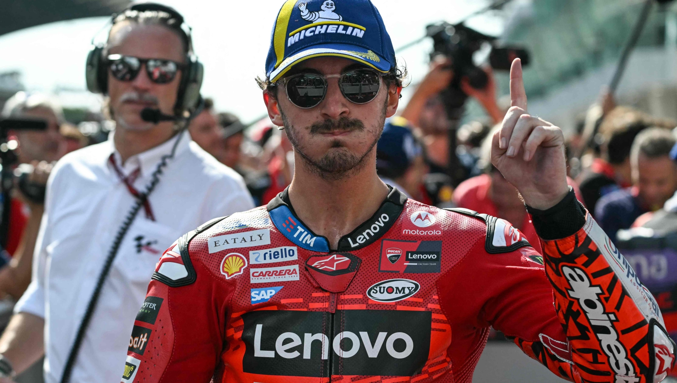 TOPSHOT - Ducati Lenovo Team's Italian rider Francesco Bagnaia celebrates his victory after the MotoGP Malaysian Grand Prix at the Sepang International Circuit in Sepang on November 3, 2024. (Photo by MOHD RASFAN / AFP)