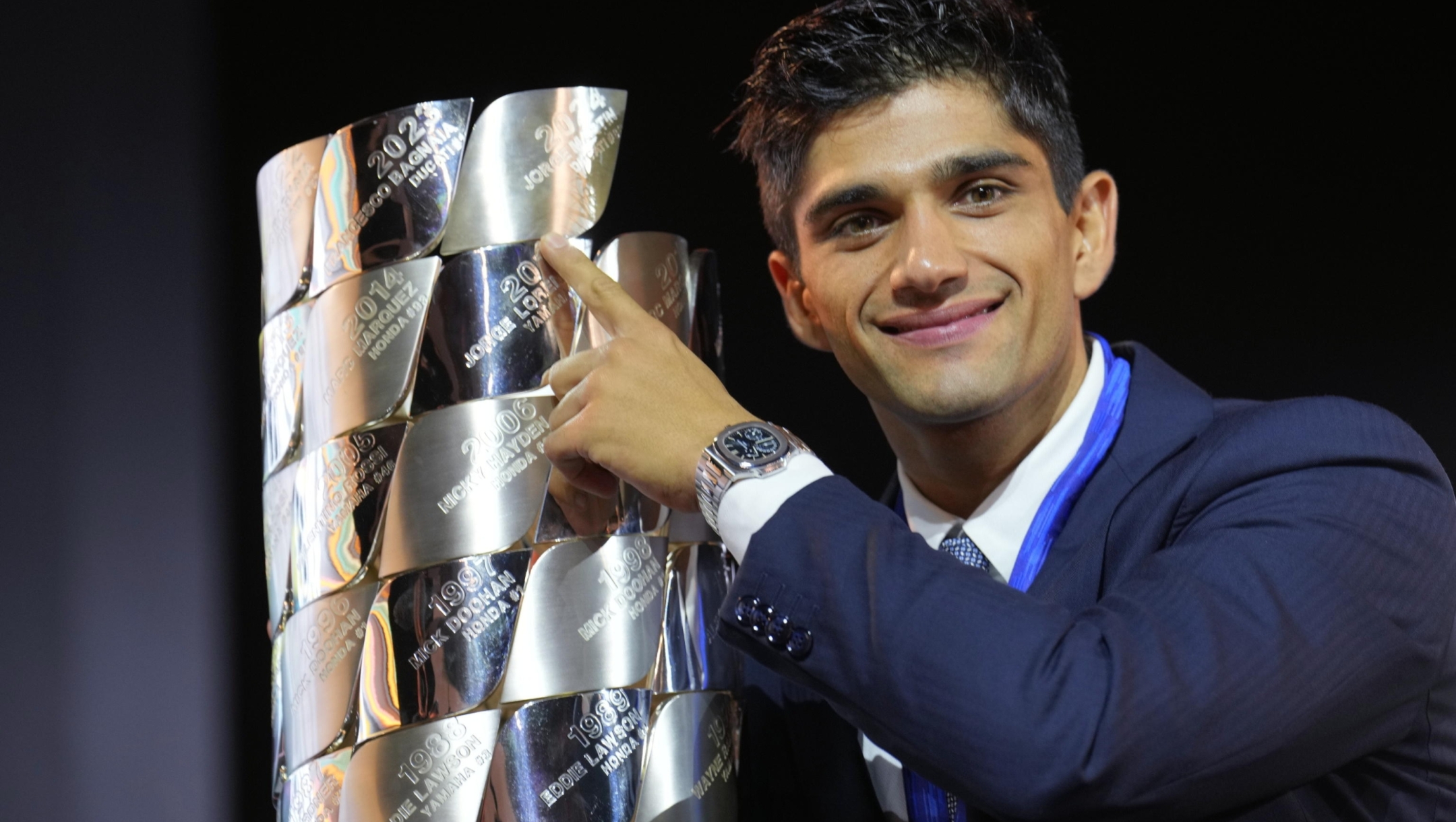 epa11726535 Spanish MotoGP rider Jorge Martin of Prima Pramac Racing team poses with his MotoGP World Championship trophy during a ceremony after he positioned third in the Barcelona Solidarity MotoGP Grand Prix at Montmelo track in Barcelona, 17 November 2024.  EPA/Alejandro Garcia