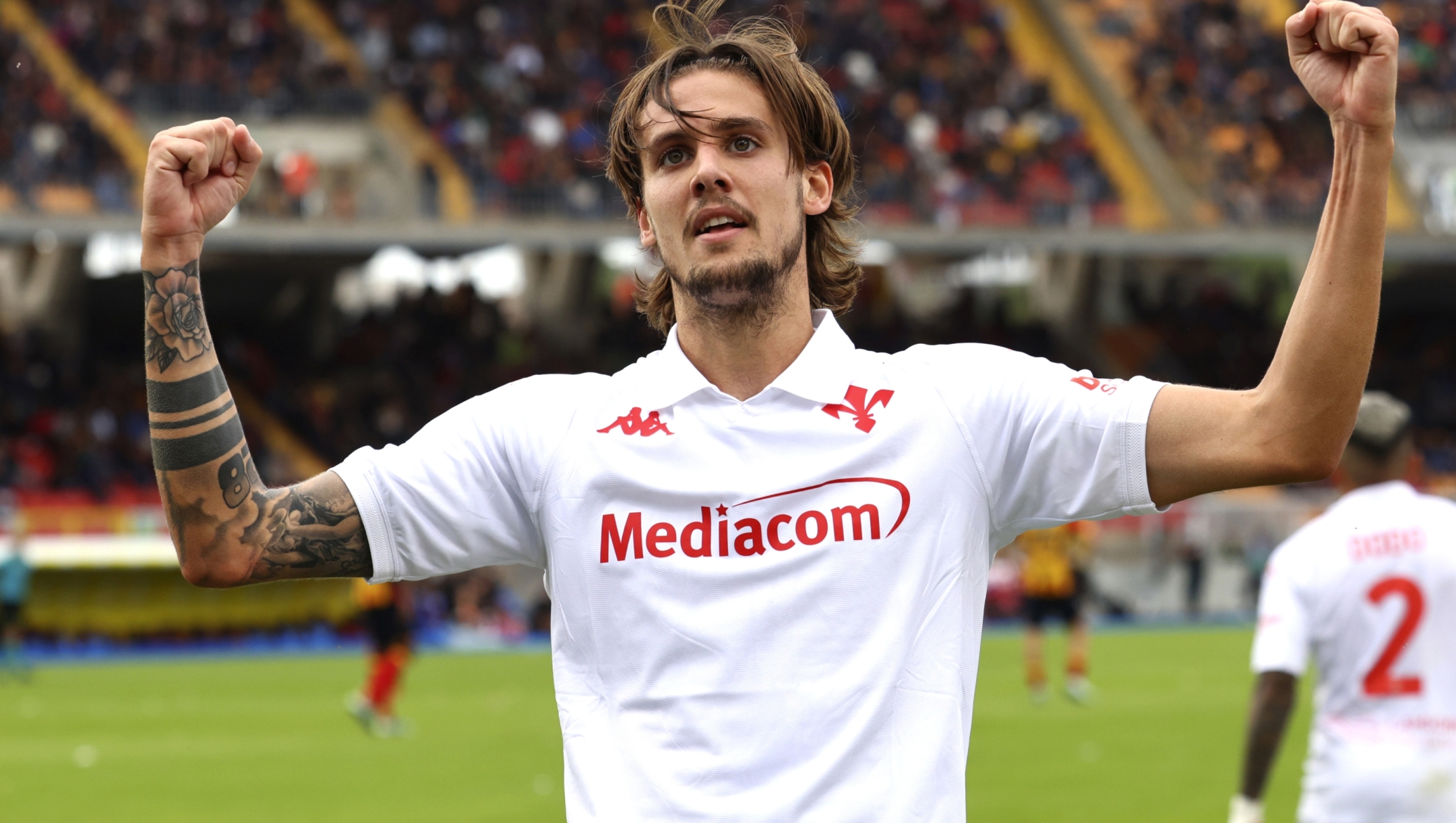 LECCE, ITALY - OCTOBER 20: Andrea Colpani of Fiorentina celebrates after scoring his team's second goal during the Serie A match between Lecce and Fiorentina at Stadio Via del Mare on October 20, 2024 in Lecce, Italy. (Photo by Maurizio Lagana/Getty Images)