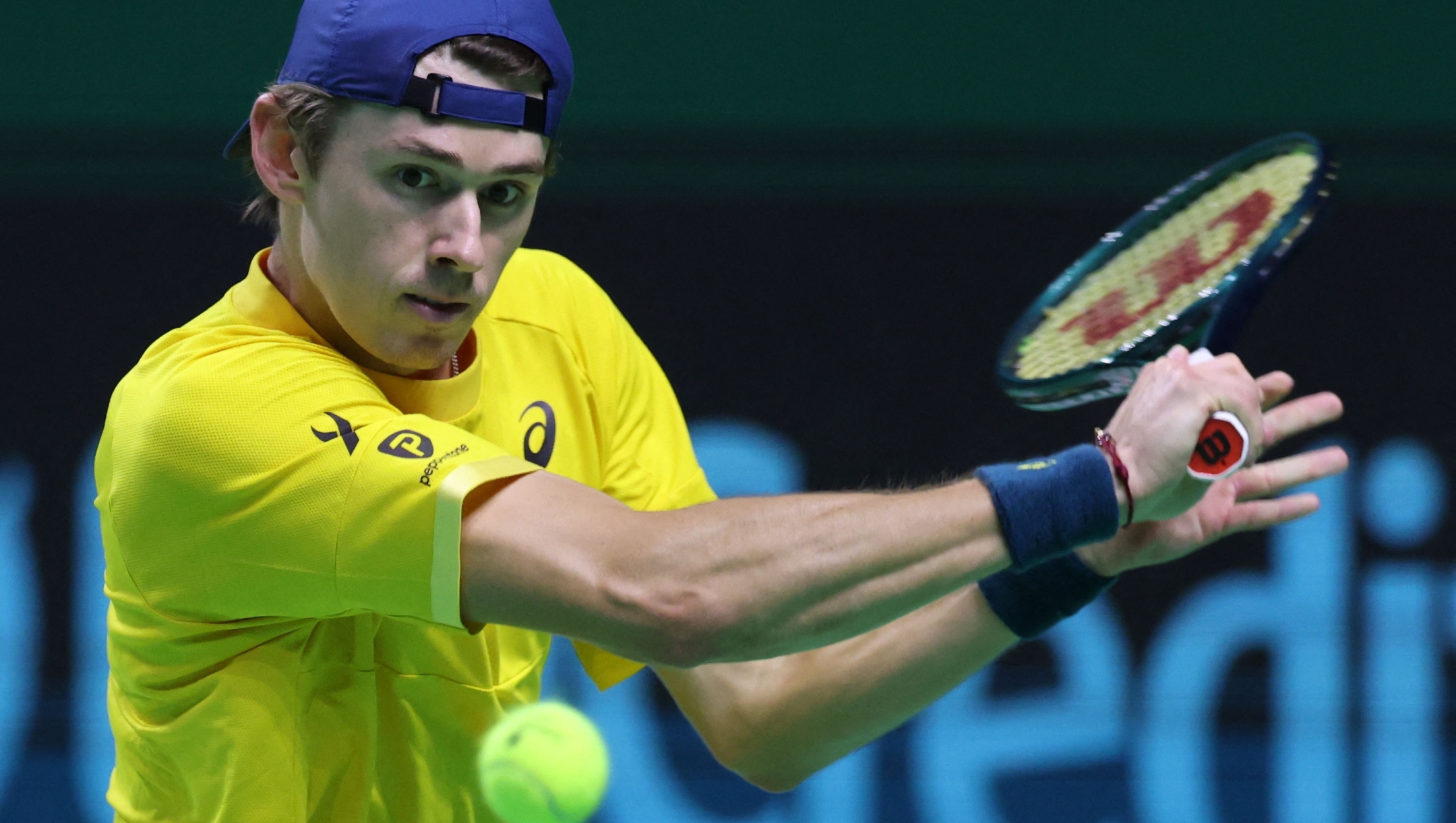 Alex de Minaur of Team Australia returns a shot to Taylor Fritz of Team USA during their quarter-final singles match between USA and Australia at the Davis Cup Finals at the Palacio de Deportes Jose Maria Martin Carpena arena in Malaga, southern Spain, on November 21, 2024. (Photo by Thomas COEX / AFP)