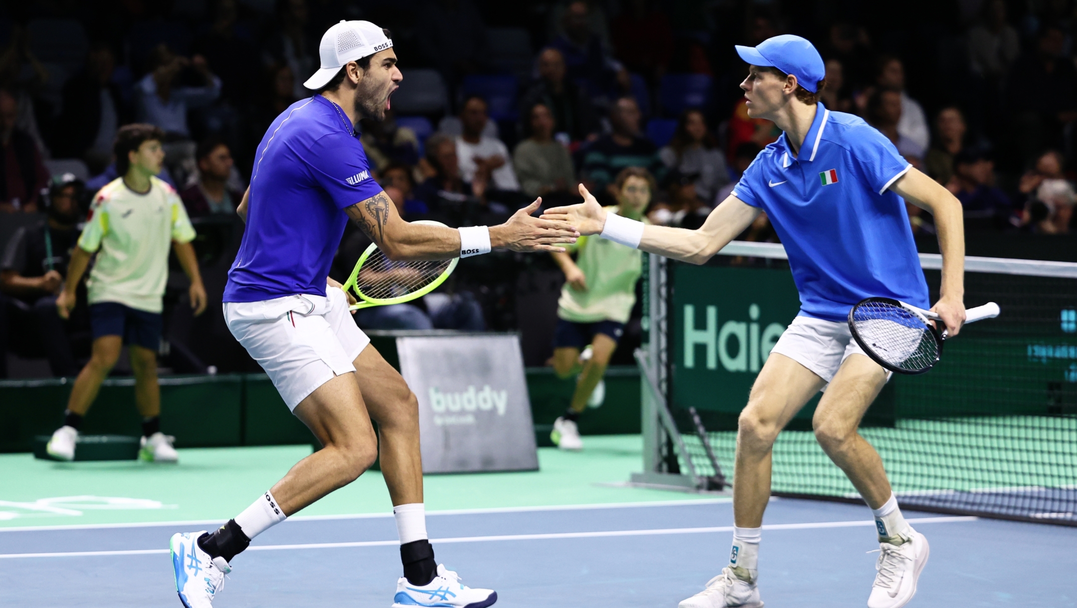 MALAGA, SPAIN - NOVEMBER 21: Matteo Berrettini and Jannik Sinner of Team Italy celebrate after winning a point during the Davis Cup Quarter Final match between Italy and Argentina at Palacio de Deportes Jose Maria Martin Carpena on November 21, 2024 in Malaga, Spain.  (Photo by Matt McNulty/Getty Images for ITF)