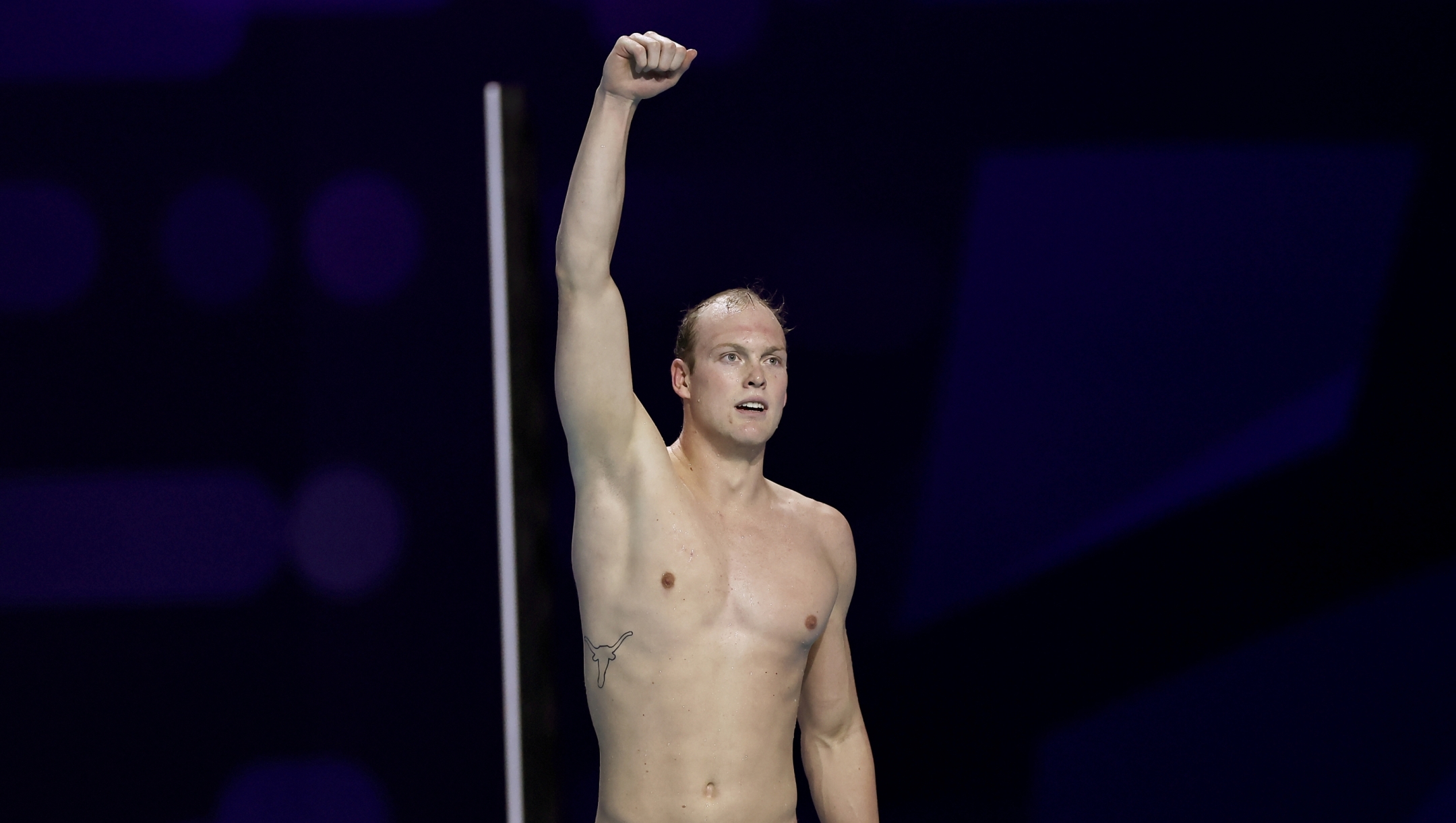 BUDAPEST, HUNGARY - DECEMBER 15: Luke Hobson of Team United States celebrates agter winning the gold medal and breaking the world record in Men?s 200m Freestyle Final during day six of the World Aquatics Swimming Championships (25m) 2024 at Duna Arena on December 15, 2024 in Budapest, Hungary.  (Photo by David Balogh/Getty Images)