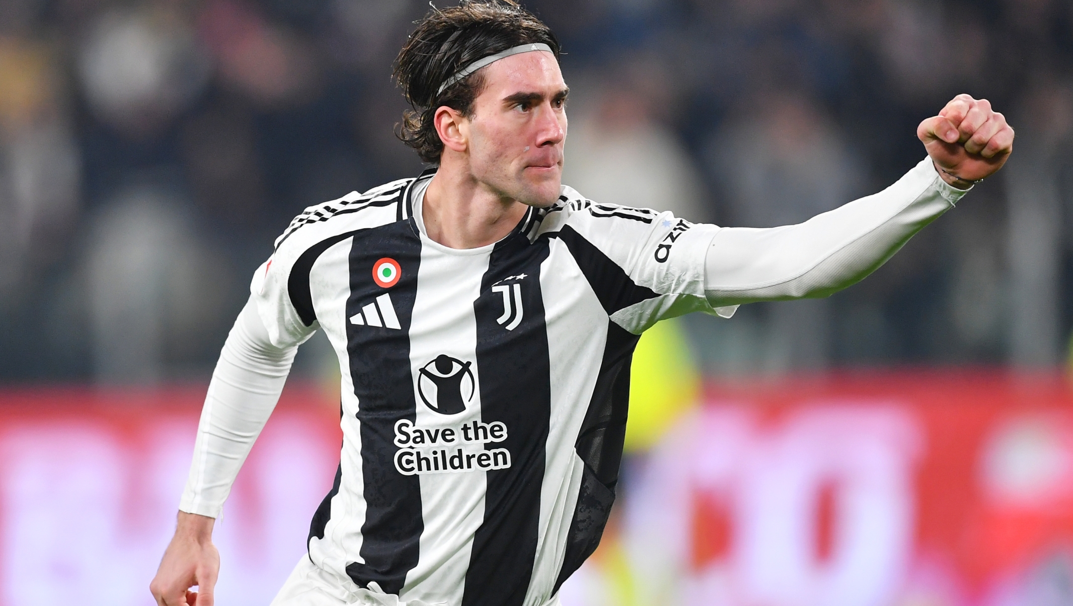 TURIN, ITALY - DECEMBER 17: Dusan Vlahovic of Juventus celebrates scoring his team's first goal during the Coppa Italia match between Juventus FC and Cagliari Calcio at Allianz Stadium on December 17, 2024 in Turin, Italy. (Photo by Valerio Pennicino/Getty Images)