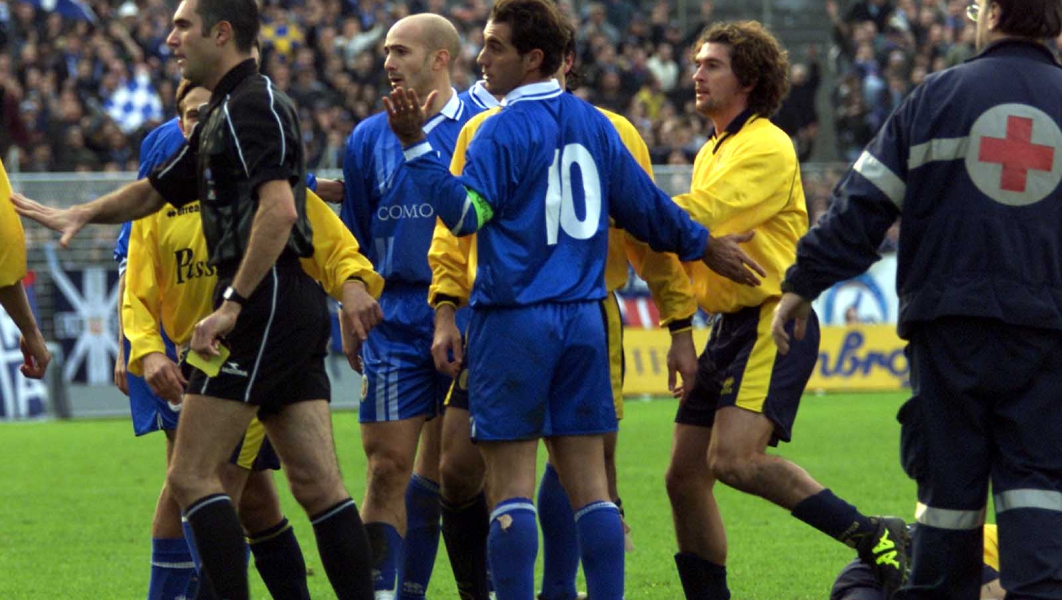 A moment of the clashes between Massimiliano Ferrigno n.10 and Francesco Bertolotti, who lies on the ground,  during November 19, 2000 match between Como and Modena. (AP Photo/Alessandro Fiochhi