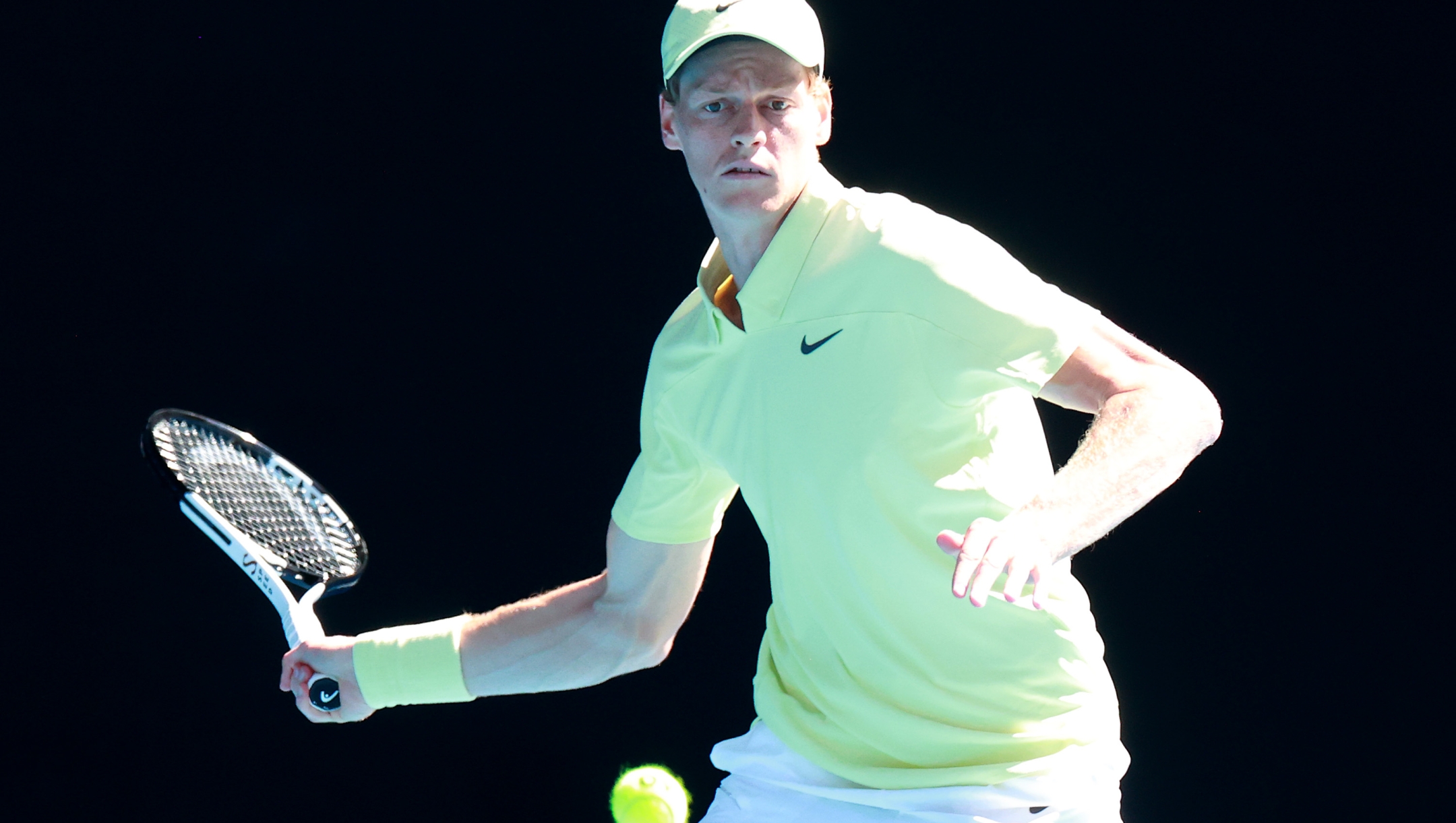 MELBOURNE, AUSTRALIA - JANUARY 07: Jannik Sinner of Italy plays a forehand during the exhibition match against Alexei Popyrin of Australia ahead of the 2025 Australian Open at Melbourne Park on January 07, 2025 in Melbourne, Australia. (Photo by Kelly Defina/Getty Images)