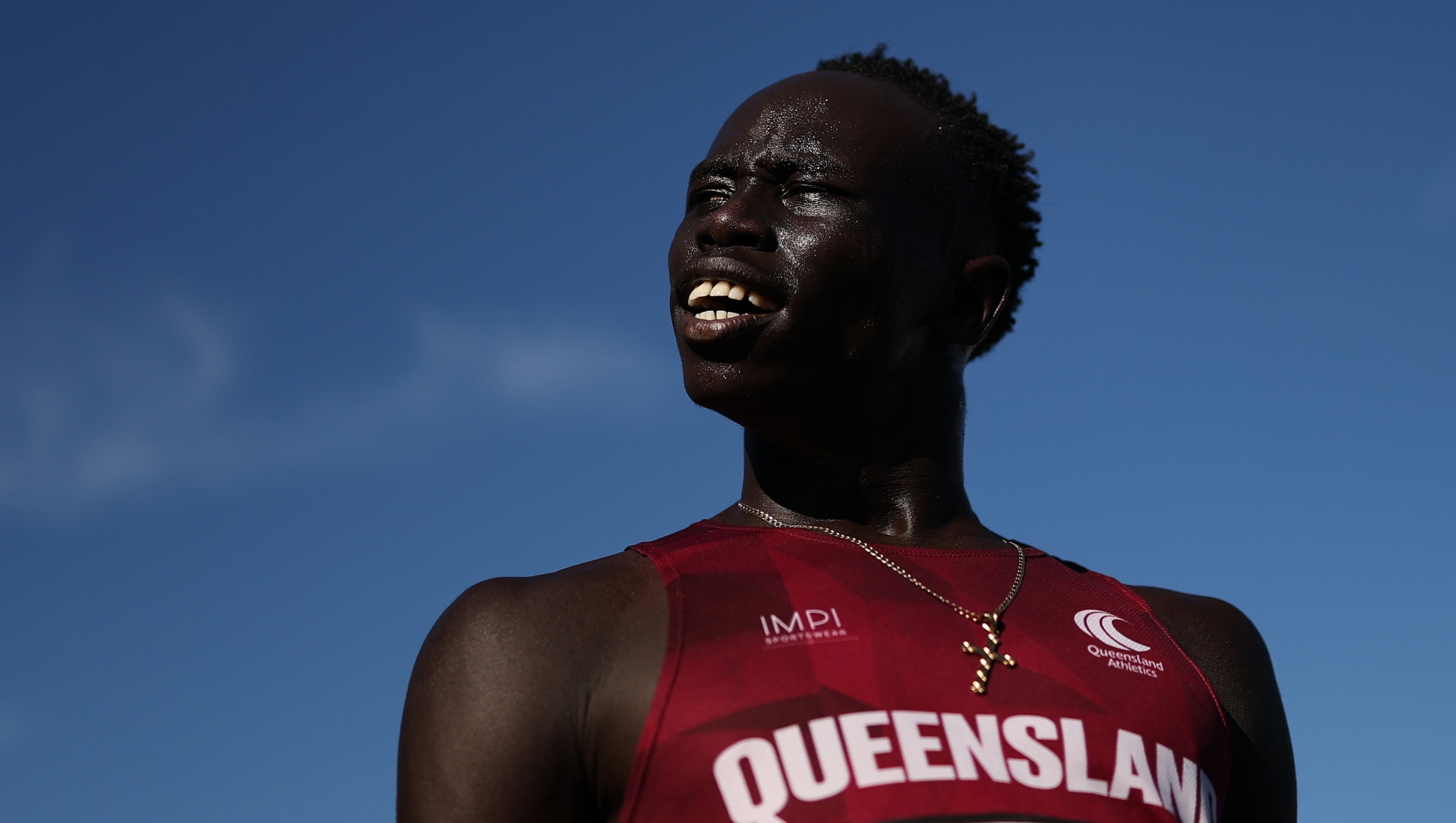 BRISBANE, AUSTRALIA - DECEMBER 07: Gout Gout of Queensland celebrates winning the Boys' U18 200m Final in a new national record time of 20.04 seconds during the 2024 Chemist Warehouse Australian All Schools Athletics Championship at Queensland Sport and Athletics Centre on December 07, 2024 in Brisbane, Australia. (Photo by Cameron Spencer/Getty Images)