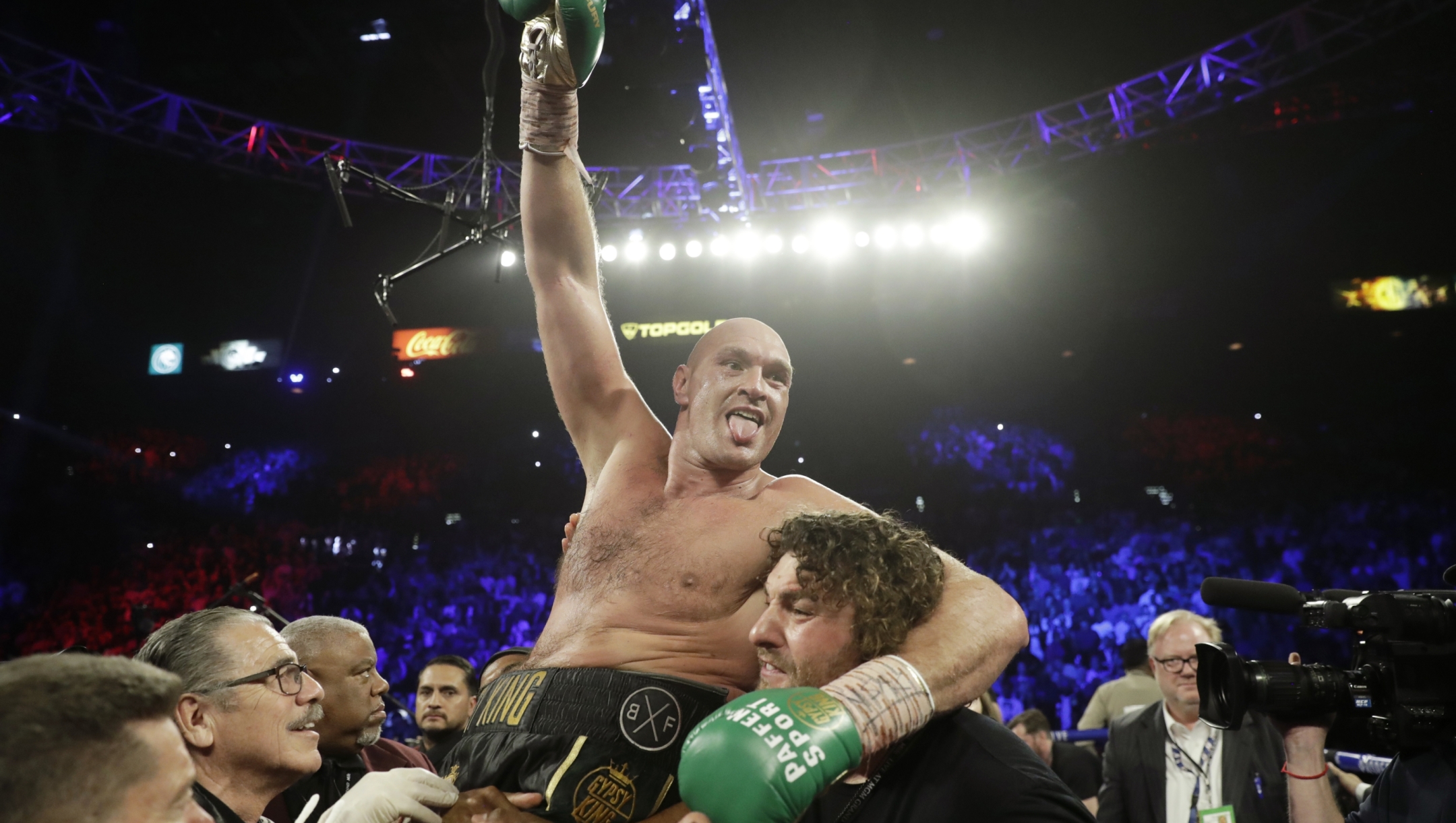 FILE - Tyson Fury, of England, celebrates after defeating Deontay Wilder in a WBC heavyweight championship boxing match Saturday, Feb. 22, 2020, in Las Vegas. (AP Photo/Isaac Brekken, File)