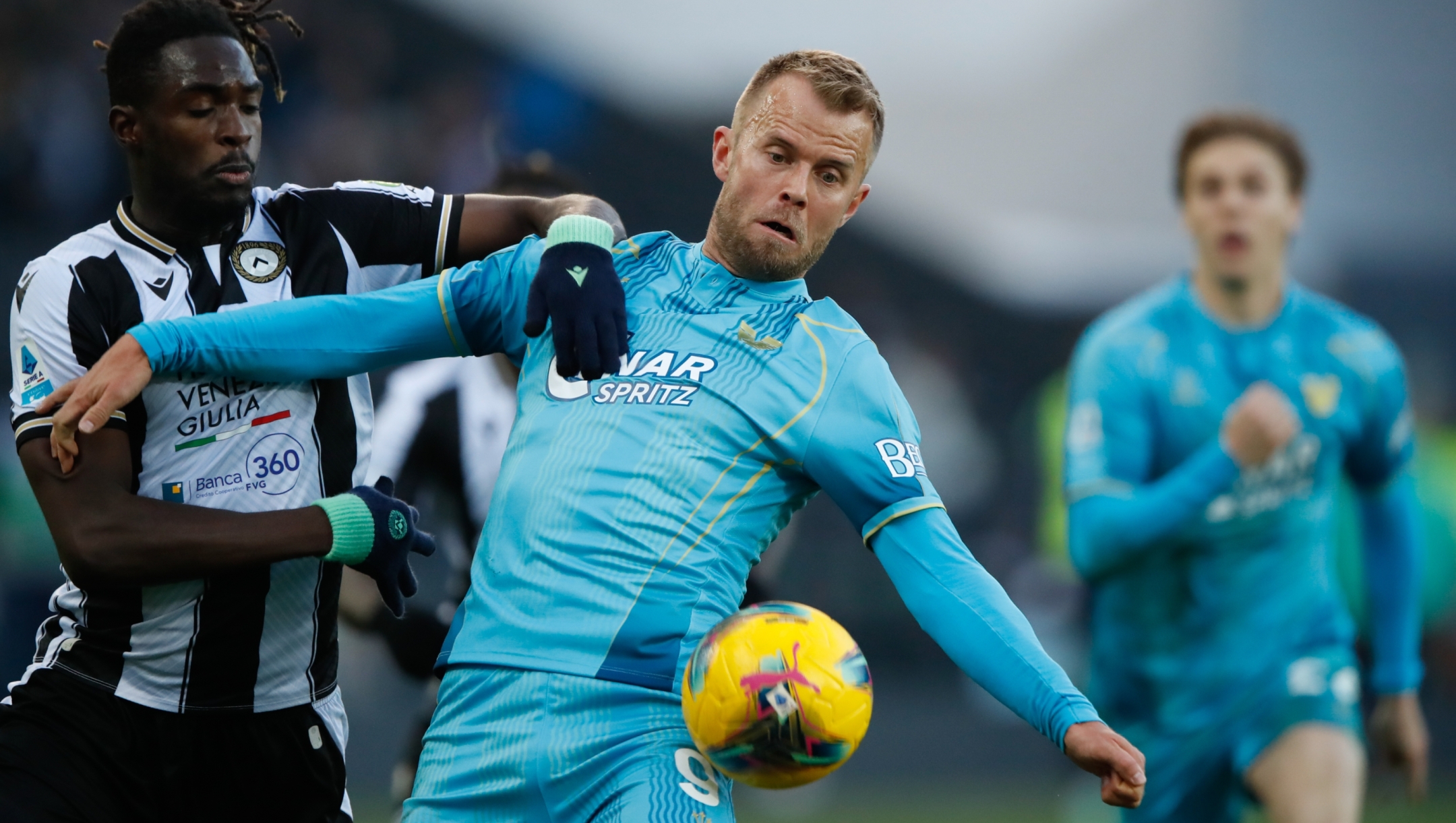 UDINE, ITALY - FEBRUARY 01: Christian Gytkjaer of Venezia and Oumar Solet of Udinese in action during the Serie A match between Udinese and Venezia at Stadio Friuli on February 01, 2025 in Udine, Italy. (Photo by Timothy Rogers/Getty Images)