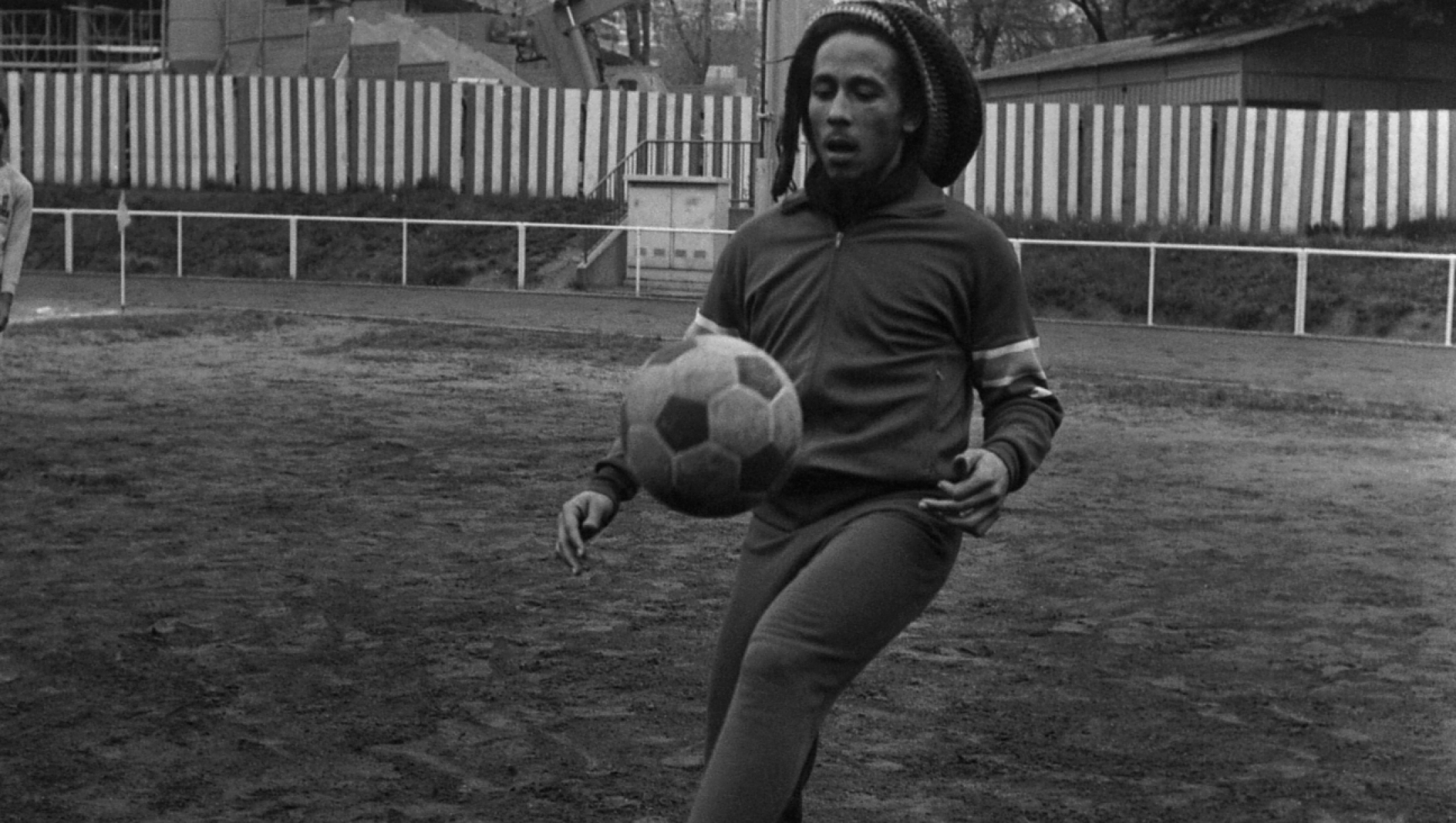 Jamaican Reggae singer Bob Marley practices his football skills at a soccer field in Paris, France, on May 10, 1977. Marley and friends were due to play in a friendly match against French personalities, but due to bad weather the match was cancelled. (AP Photo/Eustache Cardenas)