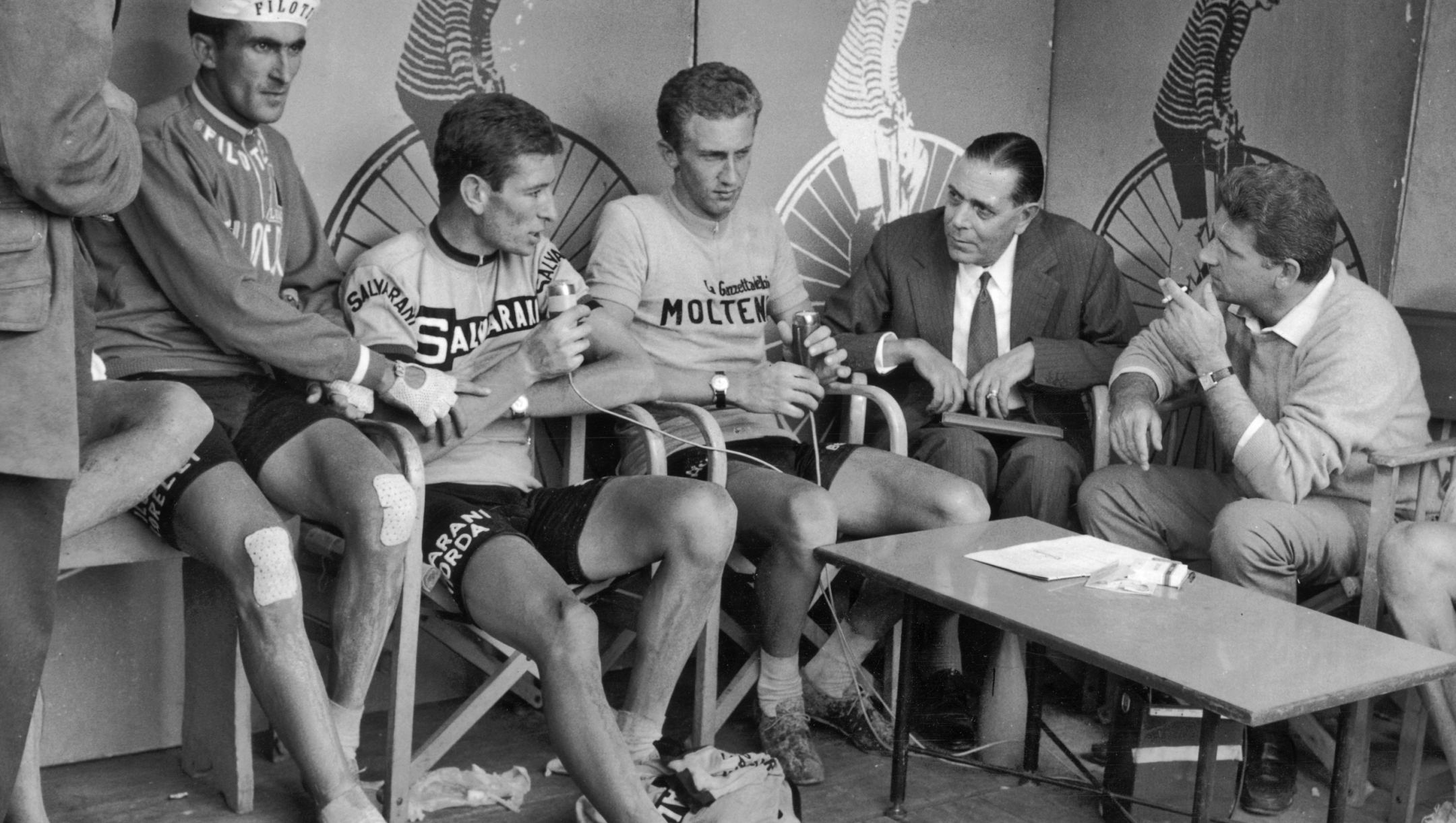 From left to right, Italian competitors Franco Bitossi, Felice Gimondi and Gianni Motta and interviewed by journalists Luigi Chierici and Sergio Zavoli during the 1966 Giro d'Italia (Tour of Italy). Motta was the overall winner of the race. (Photo by Keystone/Hulton Archive/Getty Images)