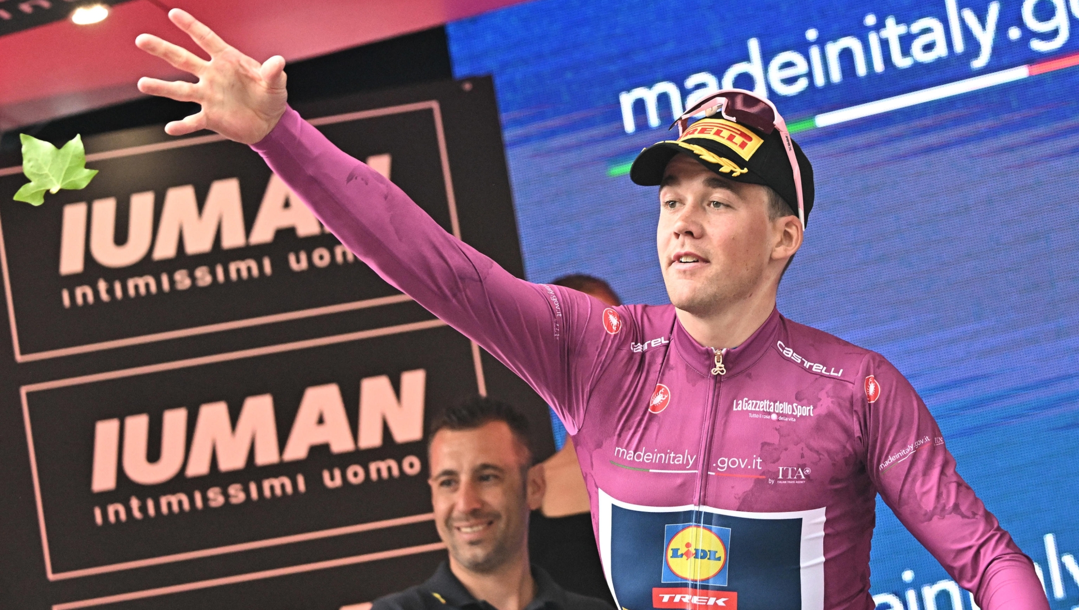 Danish rider Mads Pedersen of Lidl Trek Team wearining the points classification leader's cyclamen jersey, on the podium after the 5th stage of the Giro d'Italia cycling tour over 151 km from Ceglie Messapica to Matera, in Ceglie Messapica, Italy, 14 May 2025. ANSA/LUCA ZENNARO