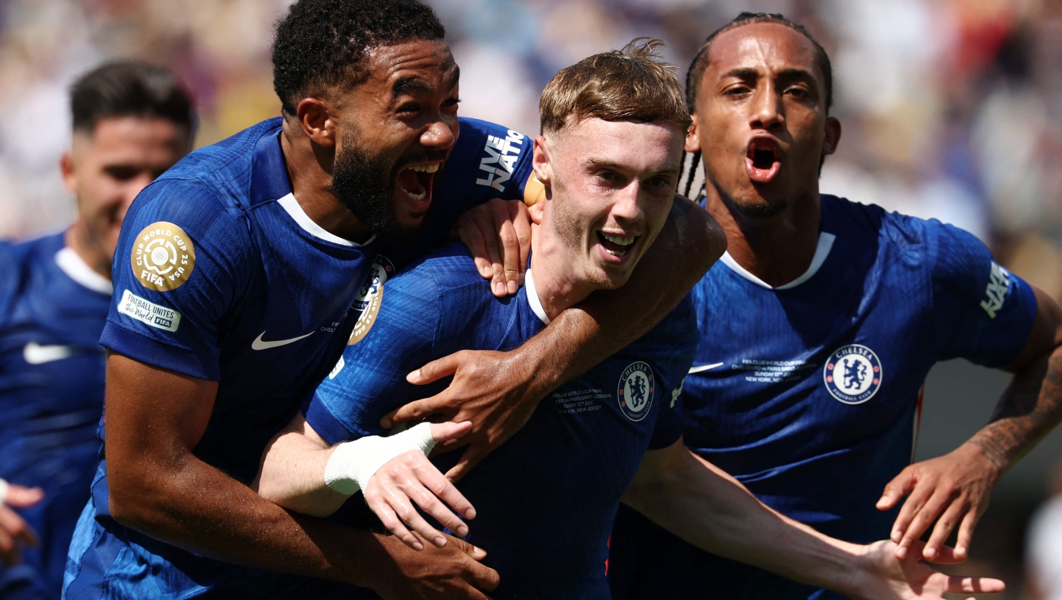 TOPSHOT - (From L) Chelsea's English defender #24 Reece James, Chelsea's English midfielder #10 Cole Palmer and Chelsea's Brazilian forward #20 Joao Pedro celebrate after Chelsea's English midfielder #10 Cole Palmer scored during the FIFA Club World Cup 2025 final football match between England's Chelsea and France's Paris Saint-Germain at the MetLife Stadium in East Rutherford, New Jersey on July 13, 2025. (Photo by FRANCK FIFE / AFP)