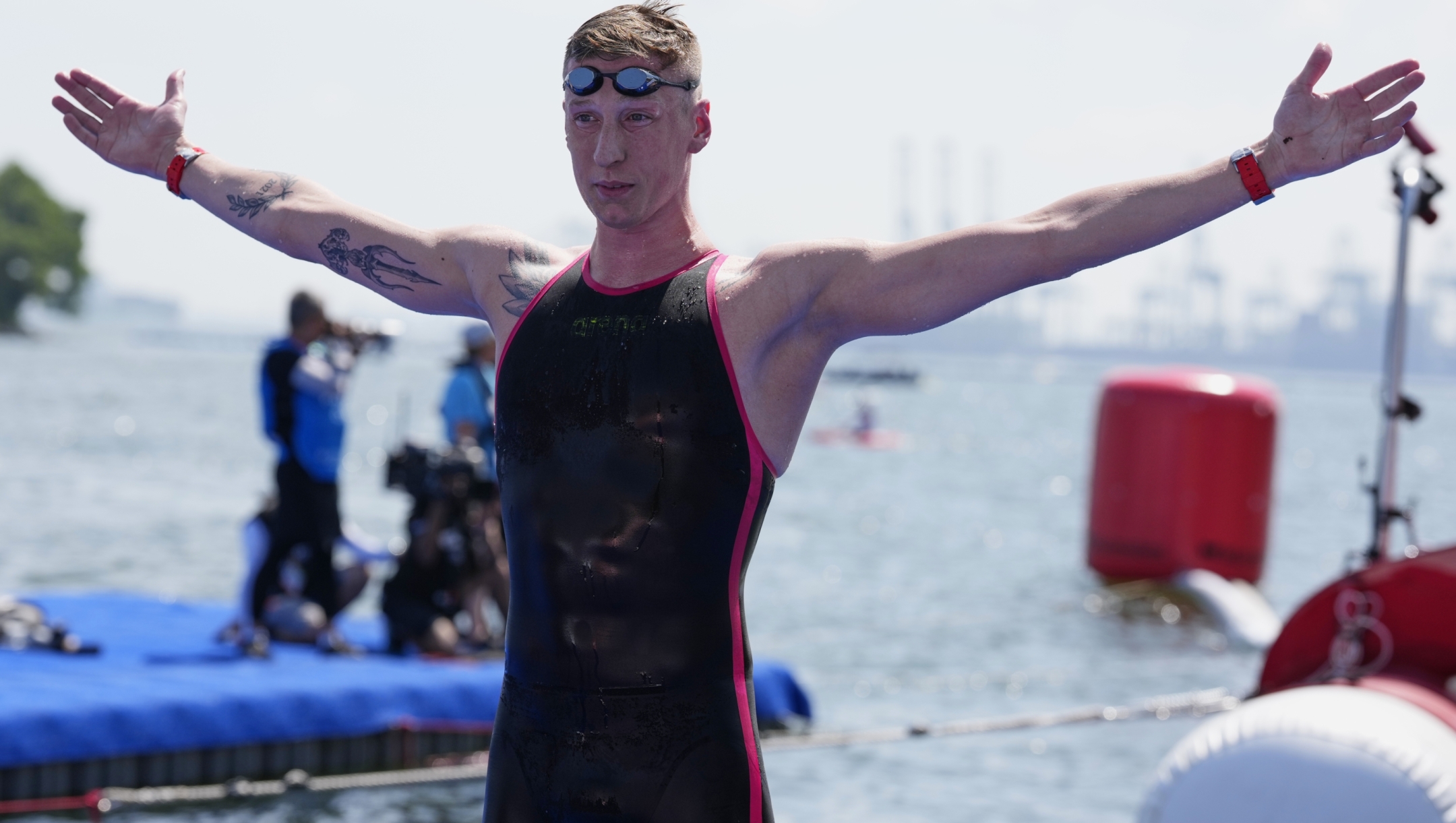Germany's Florian Wellbrock reacts after winning the men's 10km open water swim at the world swimming championships in Singapore, Wednesday, July 16, 2025. (AP Photo/Vincent Thian)