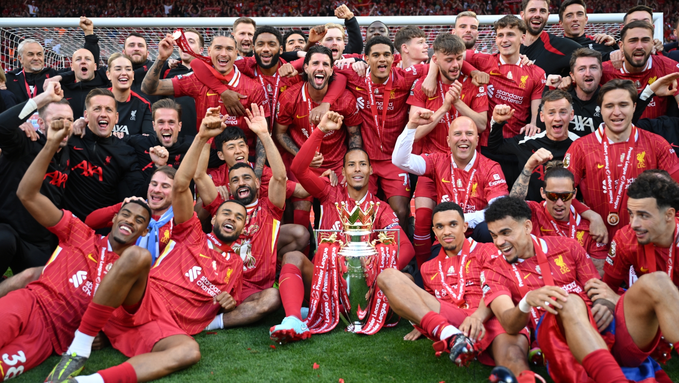 Players of Liverpool celebrate with Premier League trophy, as Liverpool are crowned the Champions of the Premier League for the 2024/25 Season, following the Premier League match between Liverpool FC and Crystal Palace FC at Anfield on May 25, 2025 in Liverpool, England. (Photo by Michael Regan/Getty Images/Getty Images For The Premier League)