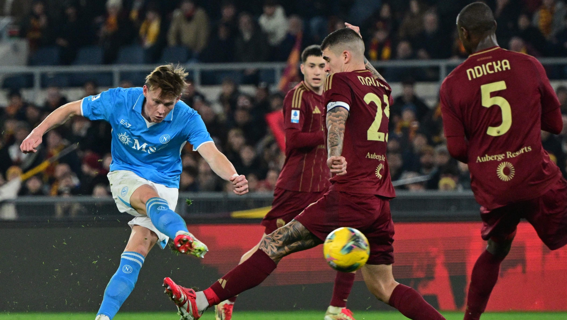 Napoli's Scottish midfielder #08 Scott Mc Tominay kicks the ball during the Italian Serie A football match between AS Roma and Napoli at the Olympic Stadium in Rome on February 2, 2025. (Photo by Tiziana FABI / AFP)
