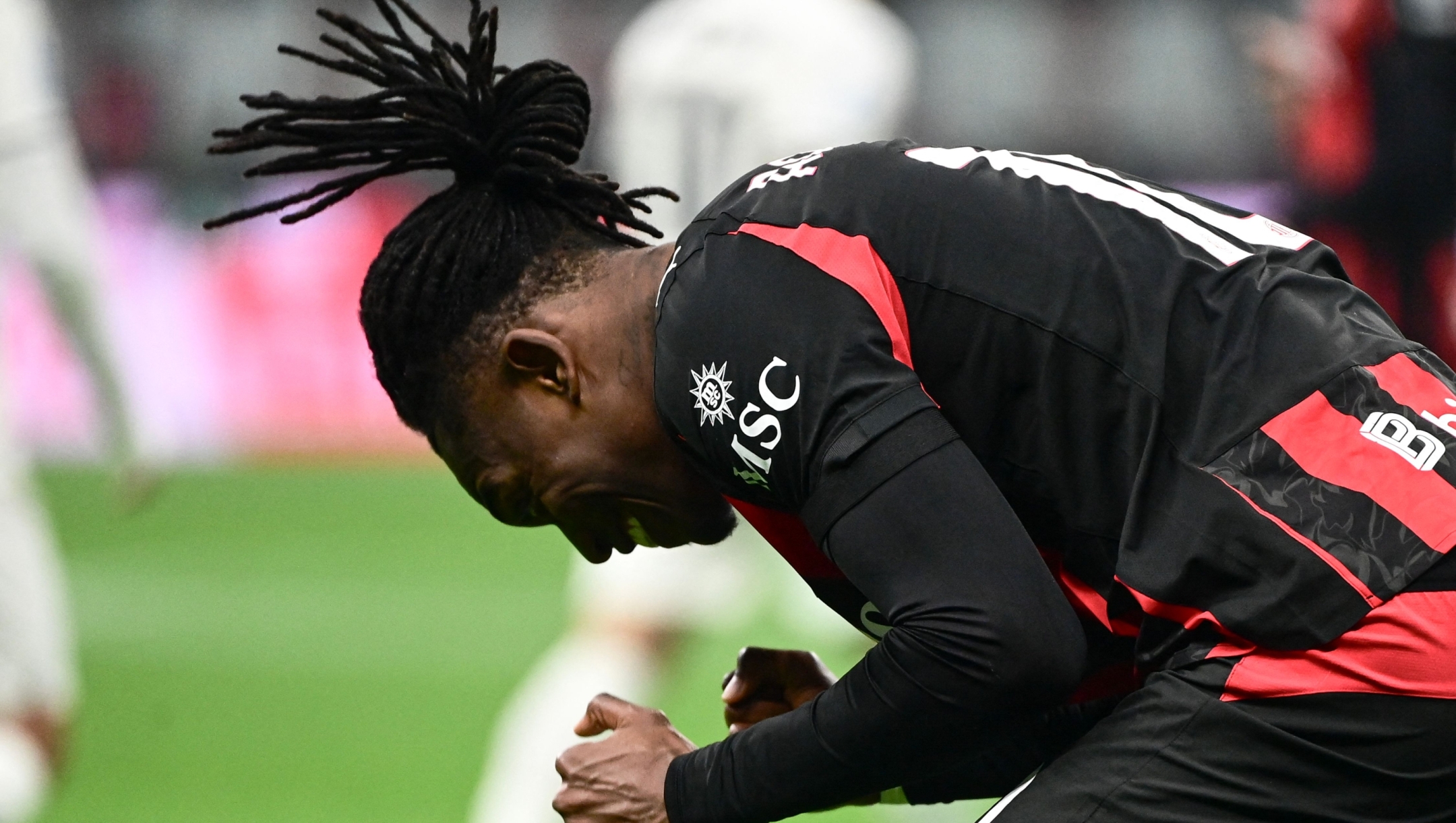 AC Milan's Portuguese forward #10 Rafael Leao celebrates his team's victory at the end of the Italian Serie A football match between AC Milan and Lazio at the San Siro stadium in Milan on November 29, 2025. (Photo by Piero CRUCIATTI / AFP)