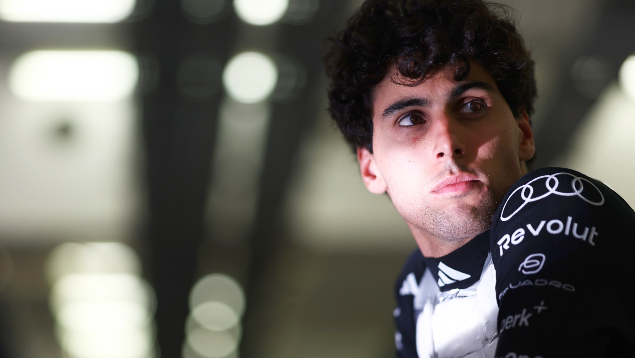  Gabriel Bortoleto of Brazil and Audi F1 Team looks on in the garage during day one of F1 Testing at Bahrain International Circuit on February 18, 2026 in Bahrain, Bahrain. (Photo by Andy Hone/LAT Images)