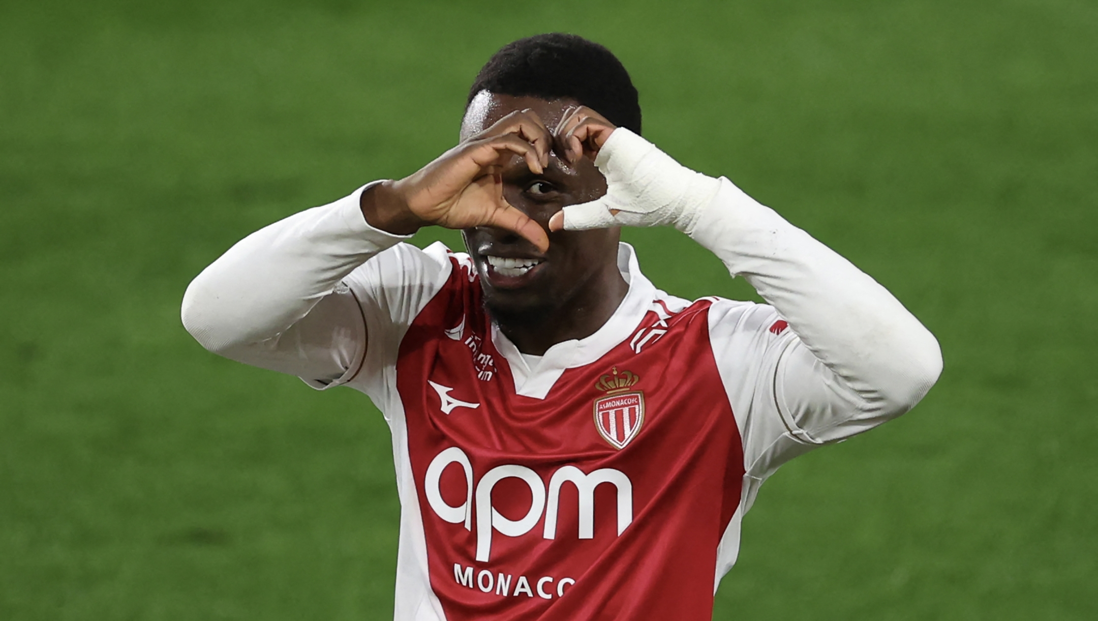 Monaco's US forward #09 Folarin Balogun celebrates scoring his team's first goal during the French L1 football match between AS Monaco and Stade Brestois 29 at the Stade Louis II in the Principality of Monaco on March 14, 2026. (Photo by Valery HACHE / AFP)