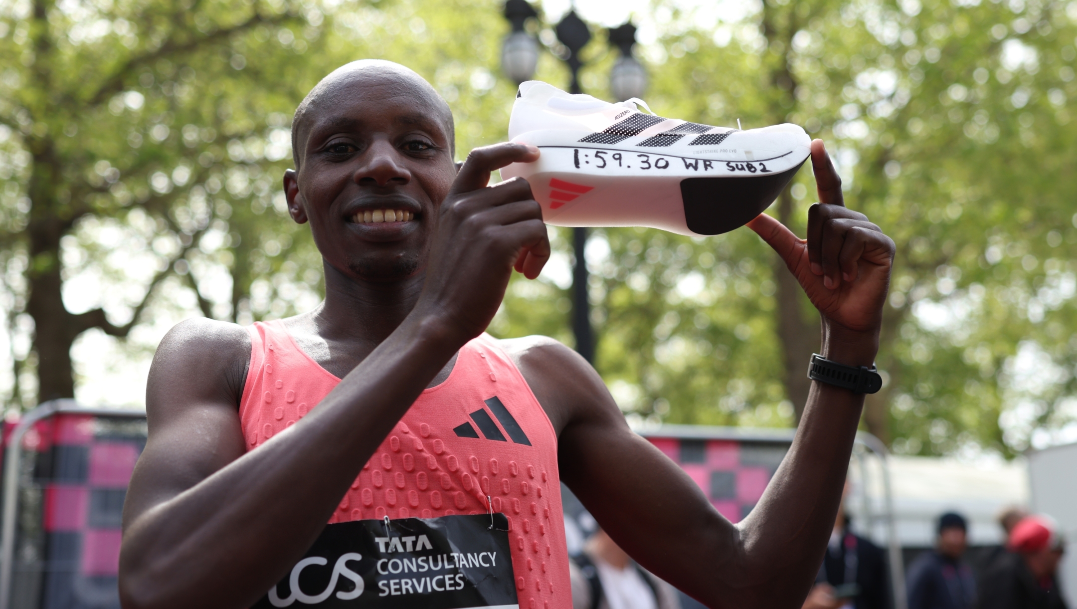  Sabastian Sawe of Team Kenya celebrates with his adidas shoe after winning with a new World Record time during the Men’s 2026 TCS London Marathon on April 26, 2026 in London, England. (Photo by Alex Davidson/Getty Images)