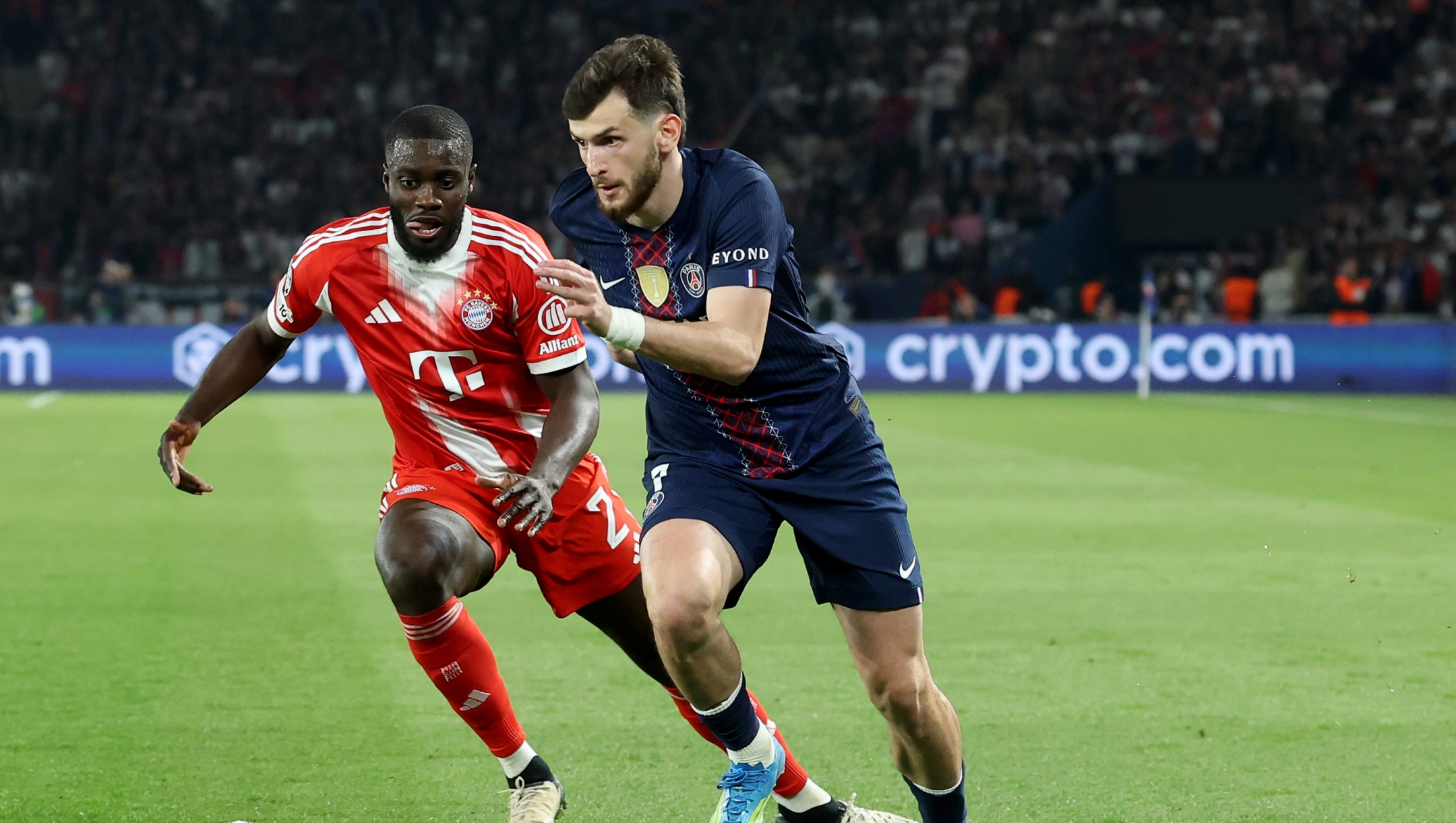  Khvicha Kvaratskhelia of Paris Saint-Germain runs with the ball against Dayot Upamecano of FC bayern MÃ¼nchen during the UEFA Champions League 2025/26 Semi Final First Leg match between Paris Saint-Germain and FC Bayern MÃ¼nchen at Parc des Princes on April 28, 2026 in Paris, France. (Photo by Alexander Hassenstein/Getty Images)