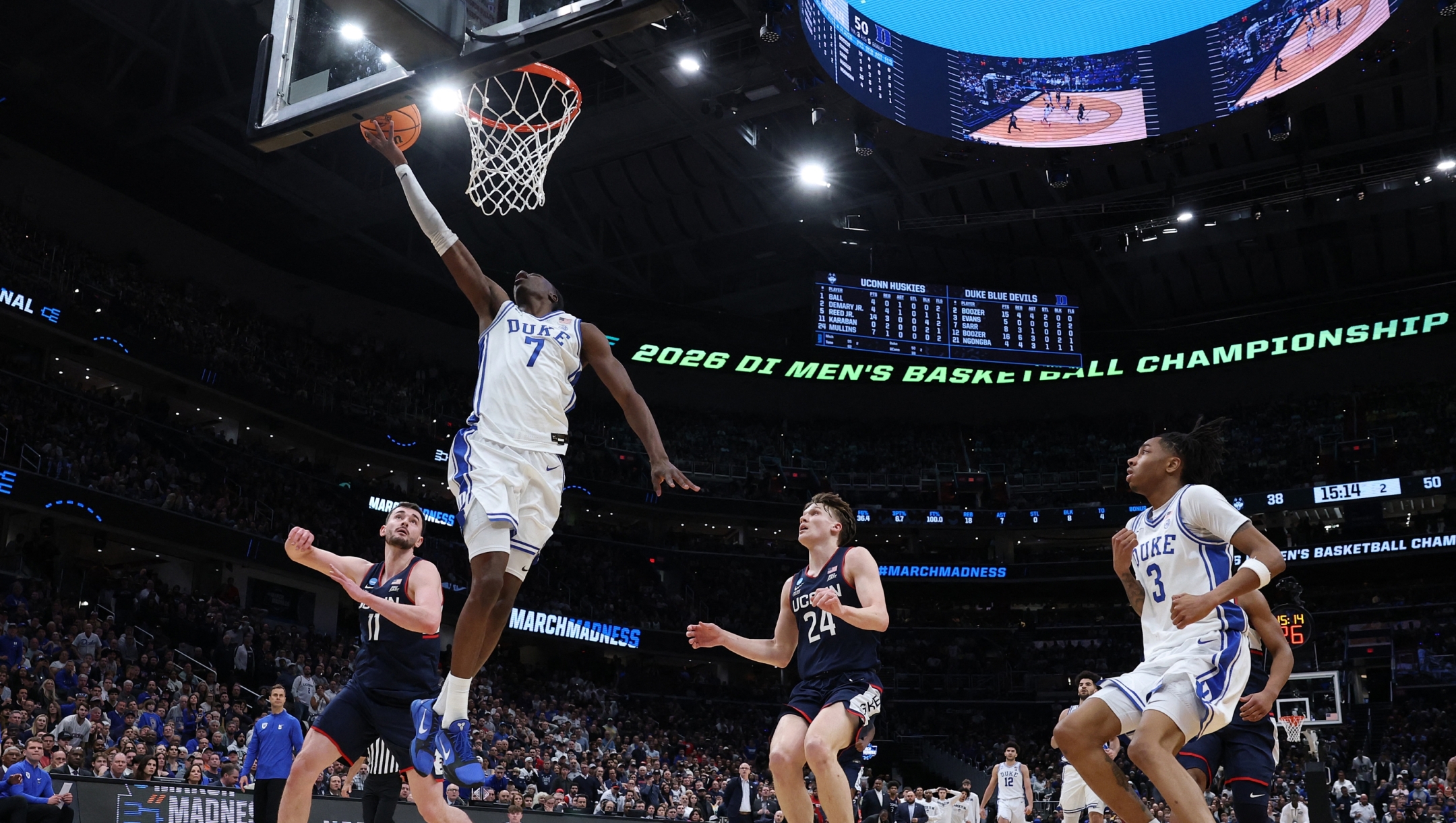  Dame Sarr #7 of the Duke Blue Devils shoots the ball against the UConn Huskies during the second half of a game in the Elite Eight of the 2026 NCAA Men's Basketball Tournament at Capital One Arena on March 29, 2026 in Washington, DC.   Emilee Chinn/Getty Images/AFP (Photo by Emilee Chinn / GETTY IMAGES NORTH AMERICA / Getty Images via AFP)